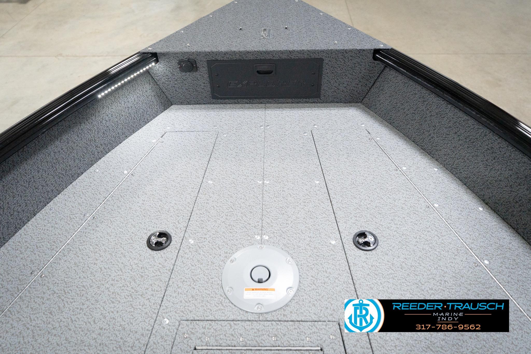 2026 Lund 1800 Explorer Sport boat interior with storage compartments and Reeder-Trausch Marine logo.