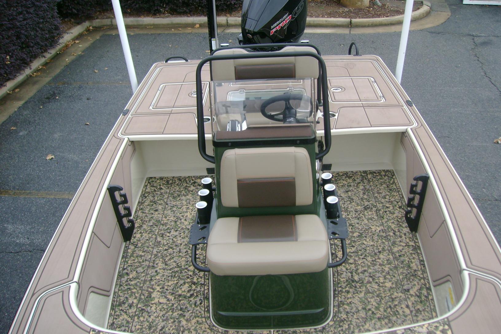 2025 Mako 18 Pro Skiff Backwater Edition with dual seats and steering console.