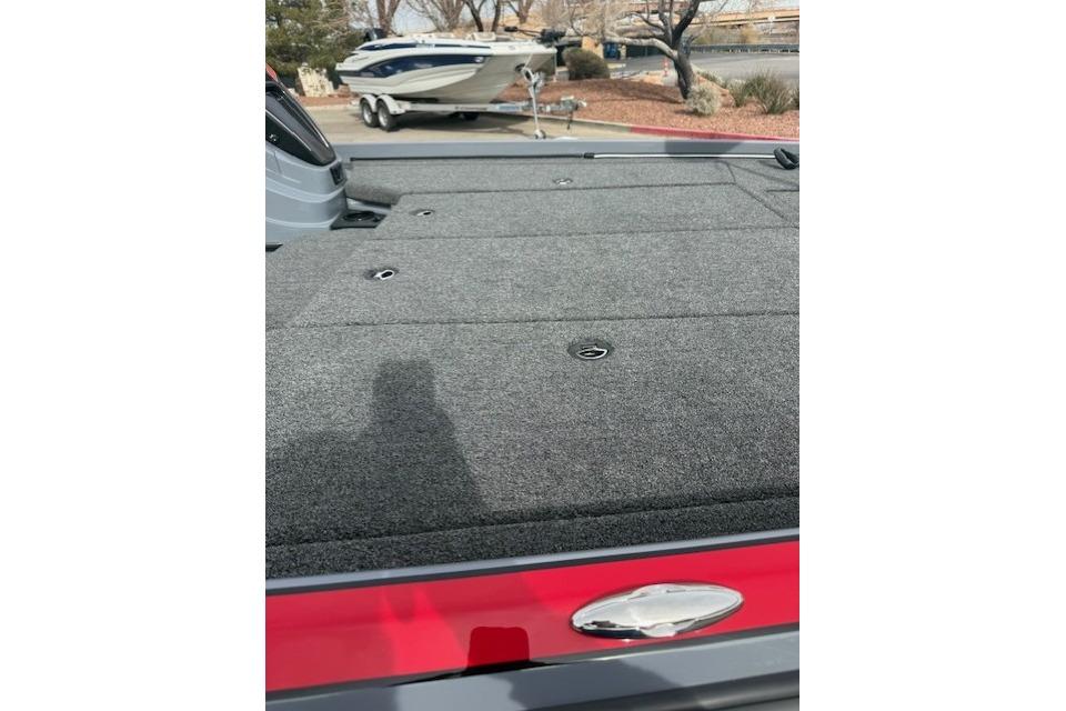 2026 Nitro Z21 XL boat deck with gray carpet and storage compartments.