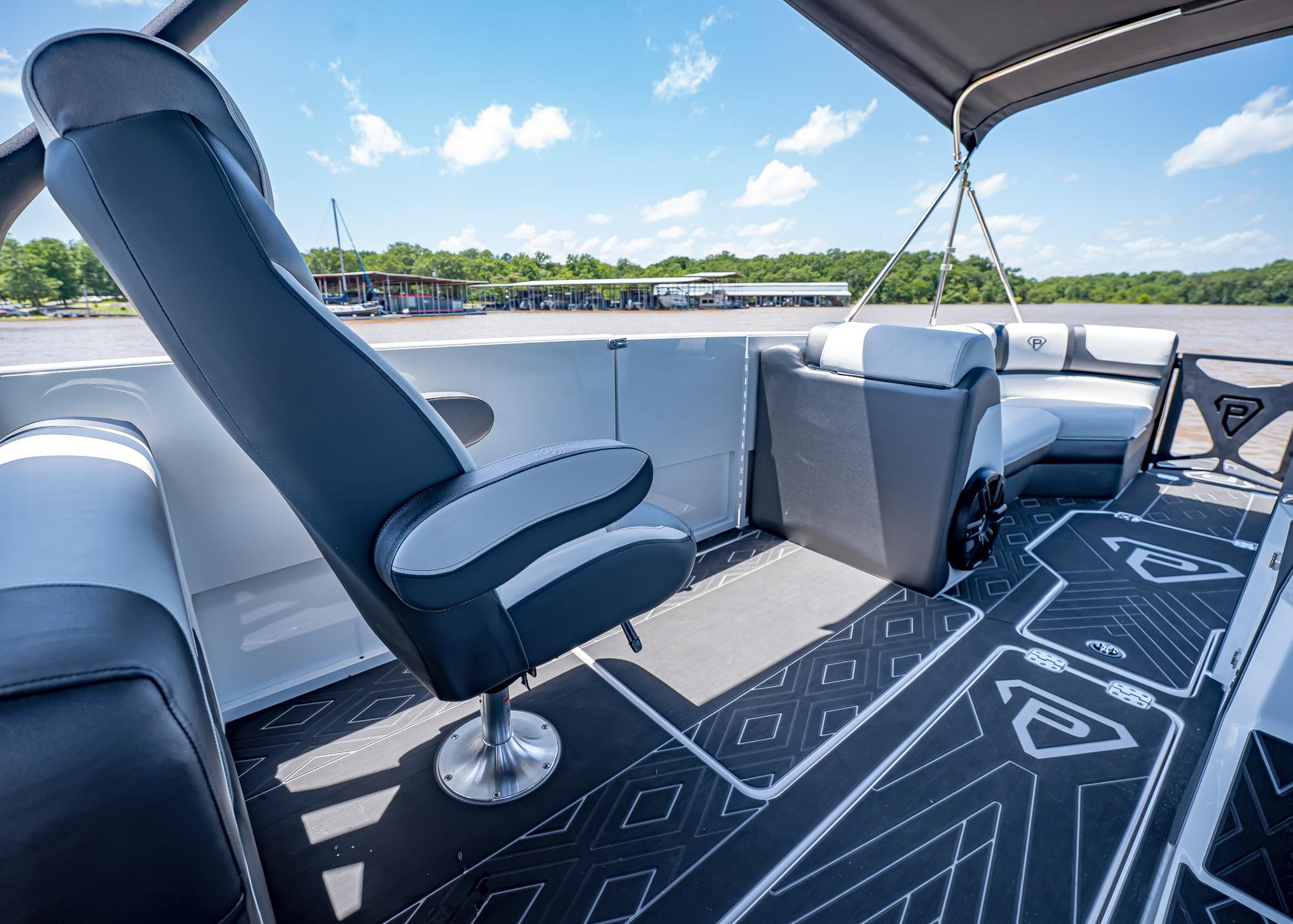 2025 Paradigm Damascus 266 Surf boat interior with modern seating and stylish flooring.