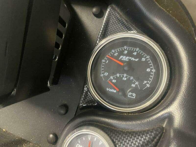 Triton 20 TRX Elite 2016 dashboard with RPM and voltage gauges.