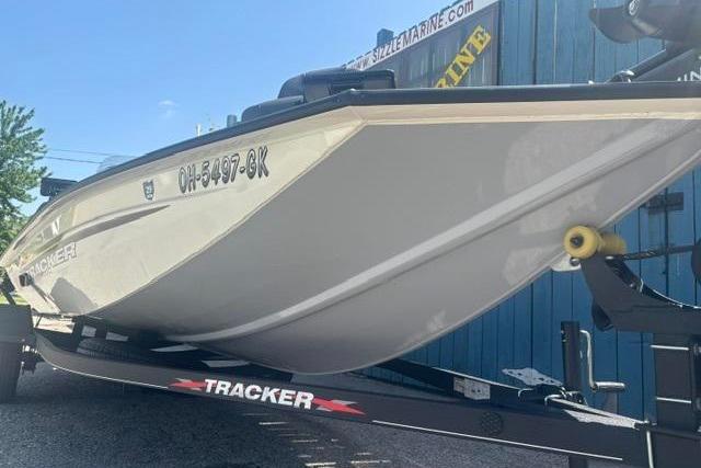 2021 Tracker Pro Team 175 TXW Tournament Edition boat on trailer, side view.
