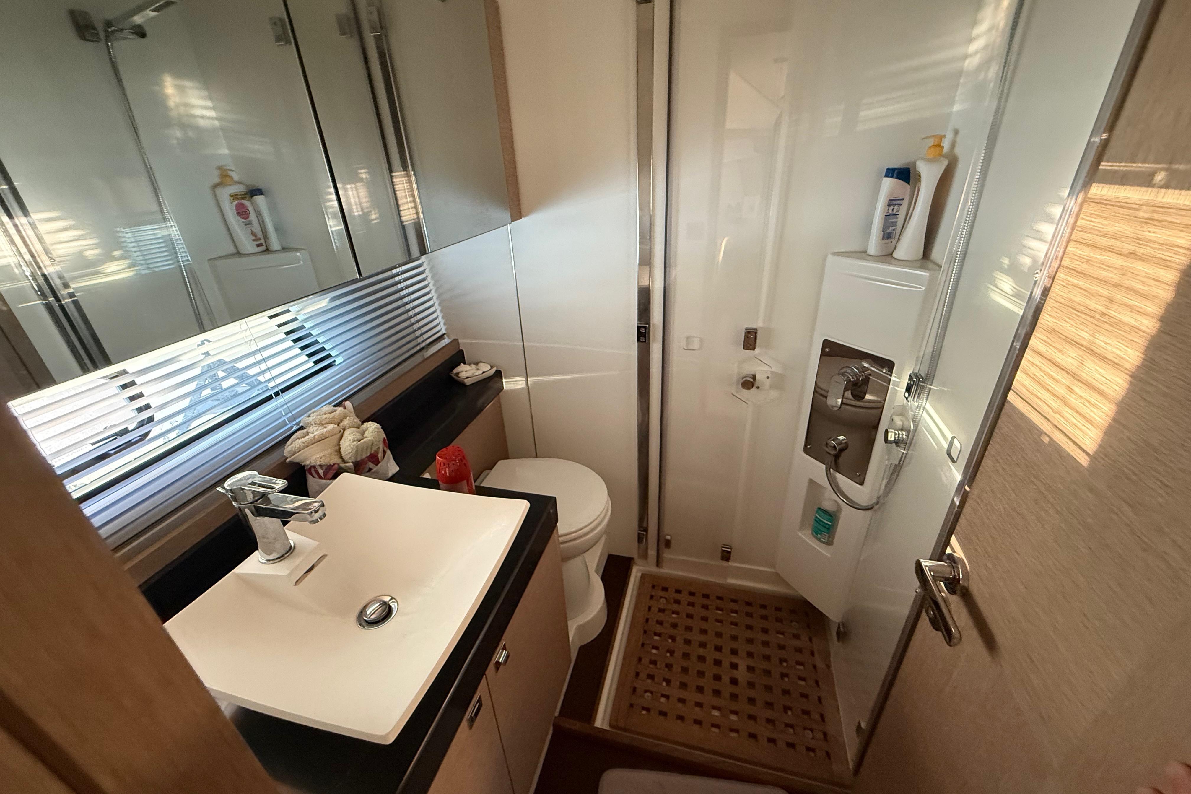 Luxurious bathroom in 2018 Prestige 500 yacht with modern fixtures and elegant design.