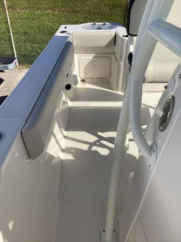 2022 Sailfish 220 CC boat interior, featuring sleek white deck and seating.
