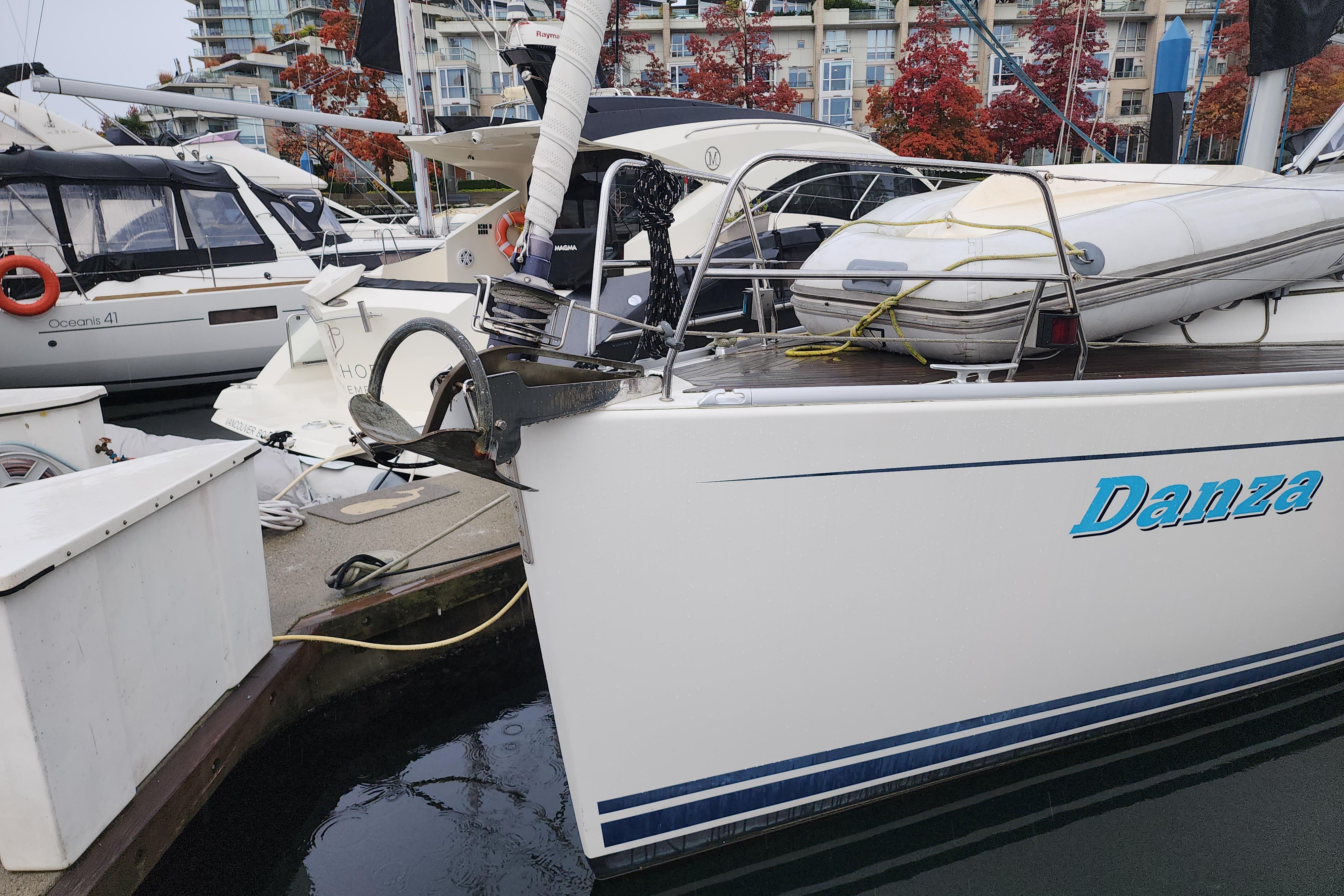 2007 Hanse 400e sailboat named Danza docked at marina with other boats.