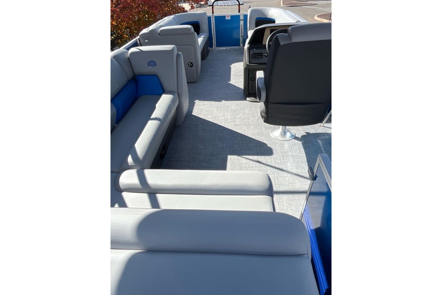2026 Sun Tracker Party Barge 20 DLX interior with spacious seating and modern design.