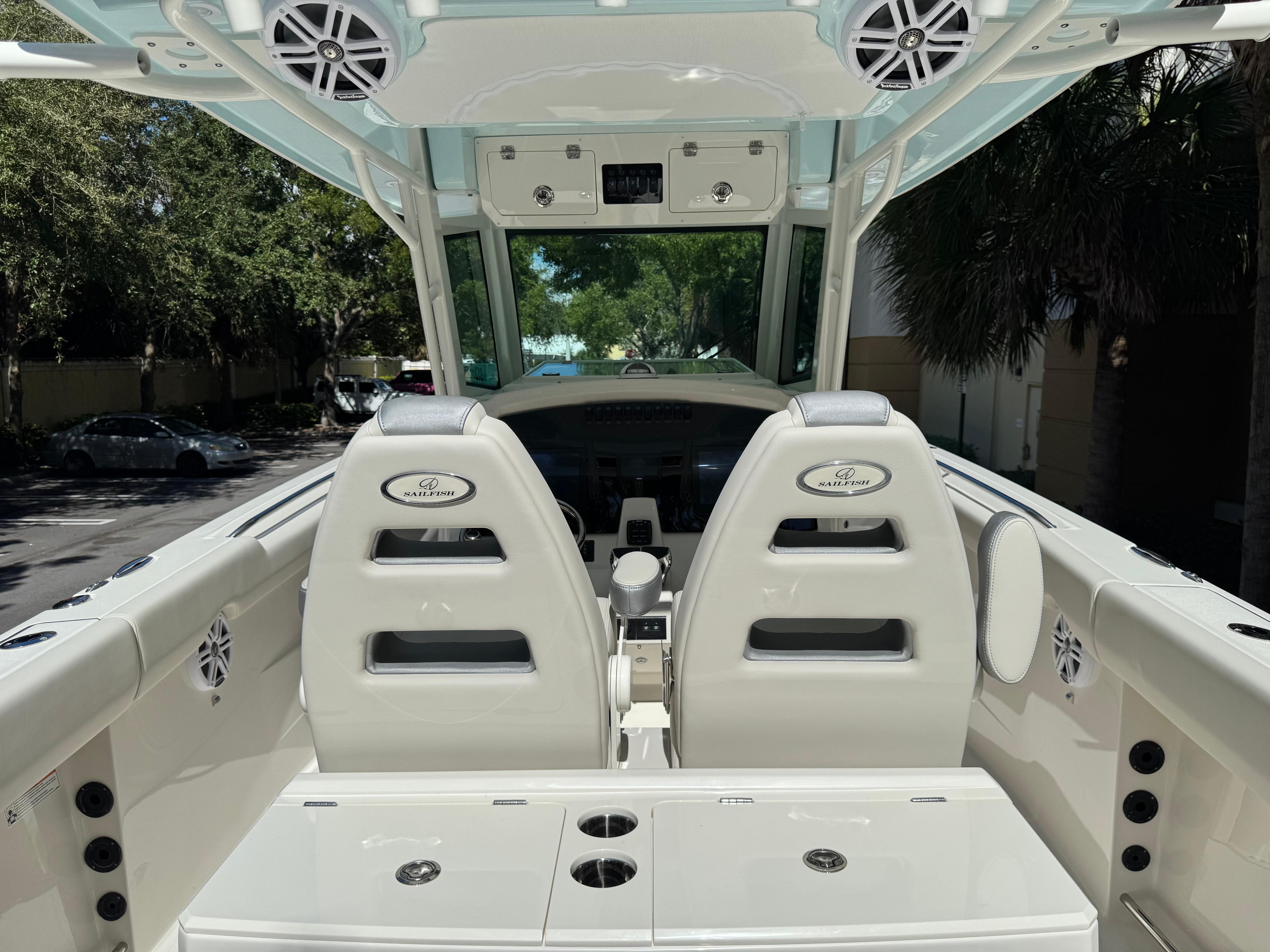 2026 Sailfish 312 CC boat interior with dual seats and modern dashboard.