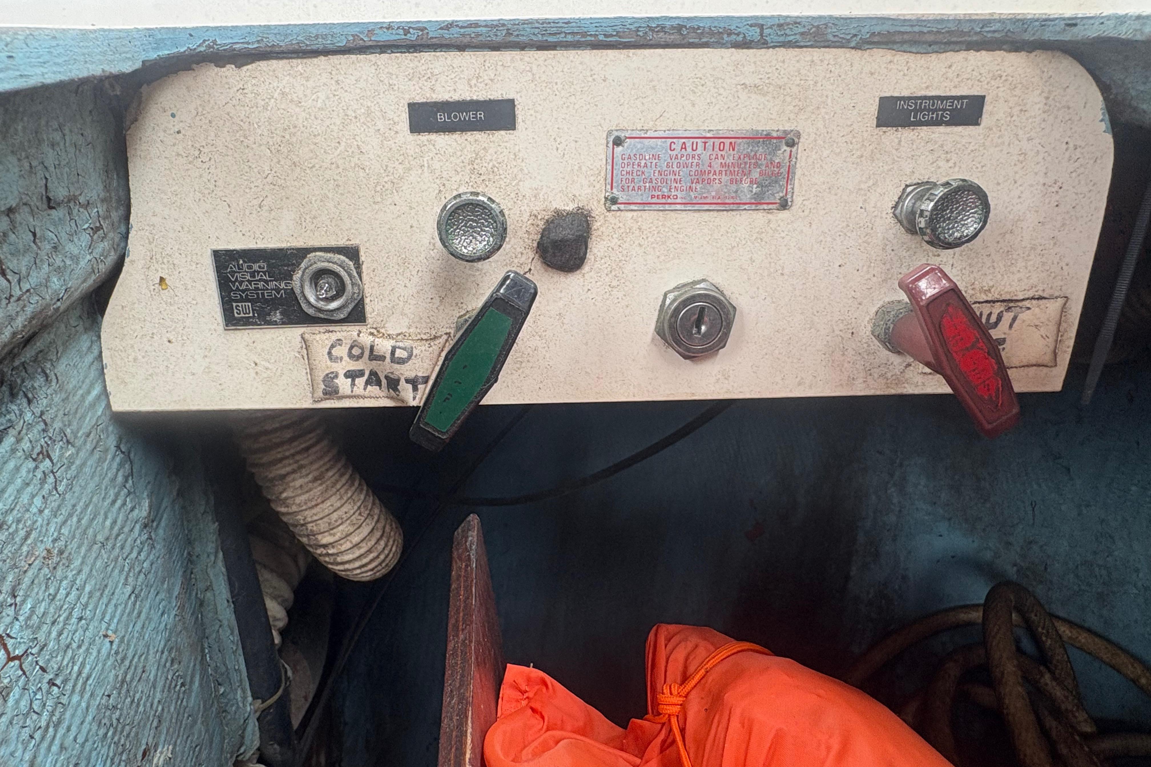 Control panel of a 1981 Sabre 31 boat with labeled switches and knobs.