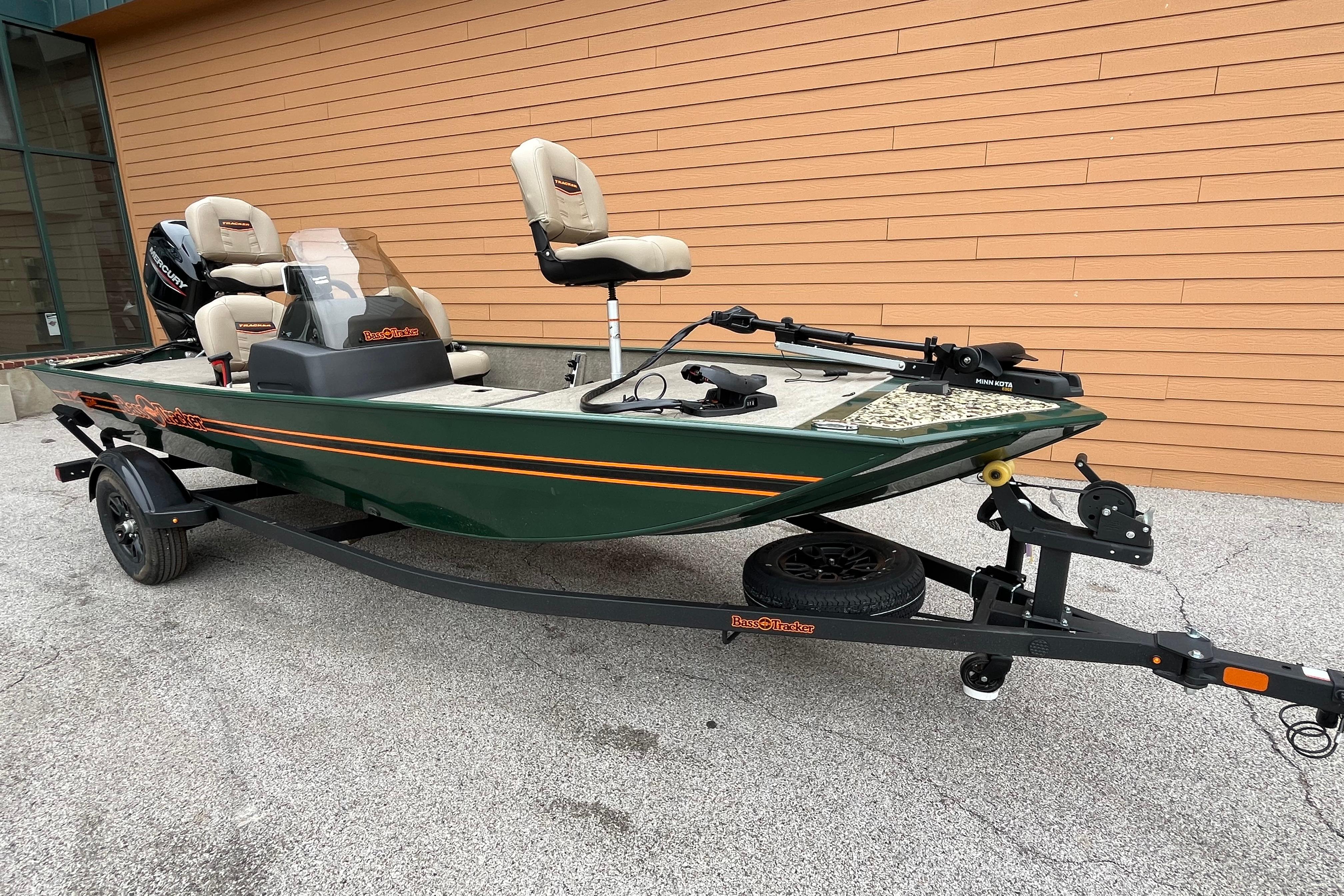 2026 Tracker Bass Tracker Classic Limited boat on trailer, parked outdoors.