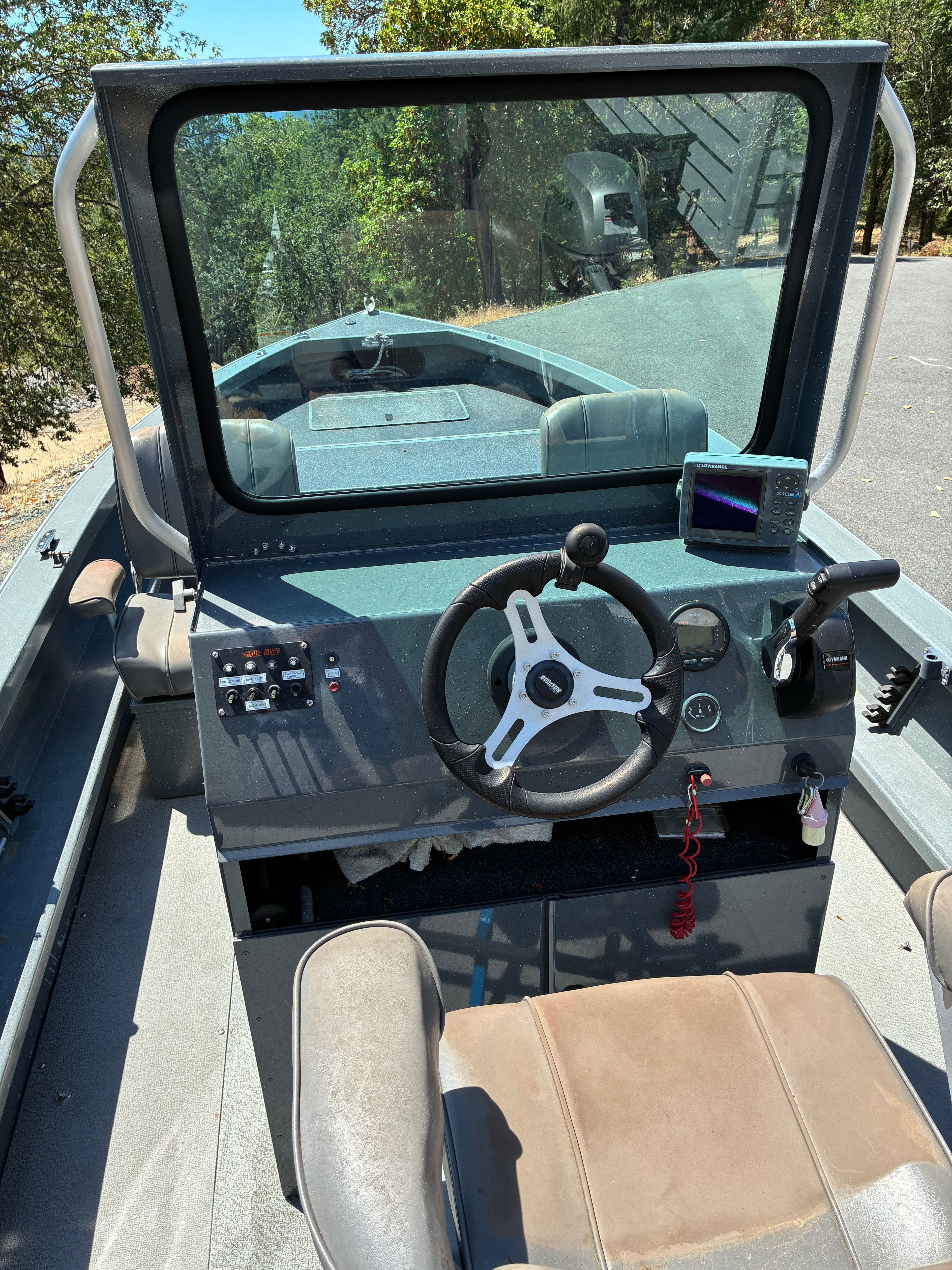 2003 North River SCOUT helm with steering wheel and electronics.