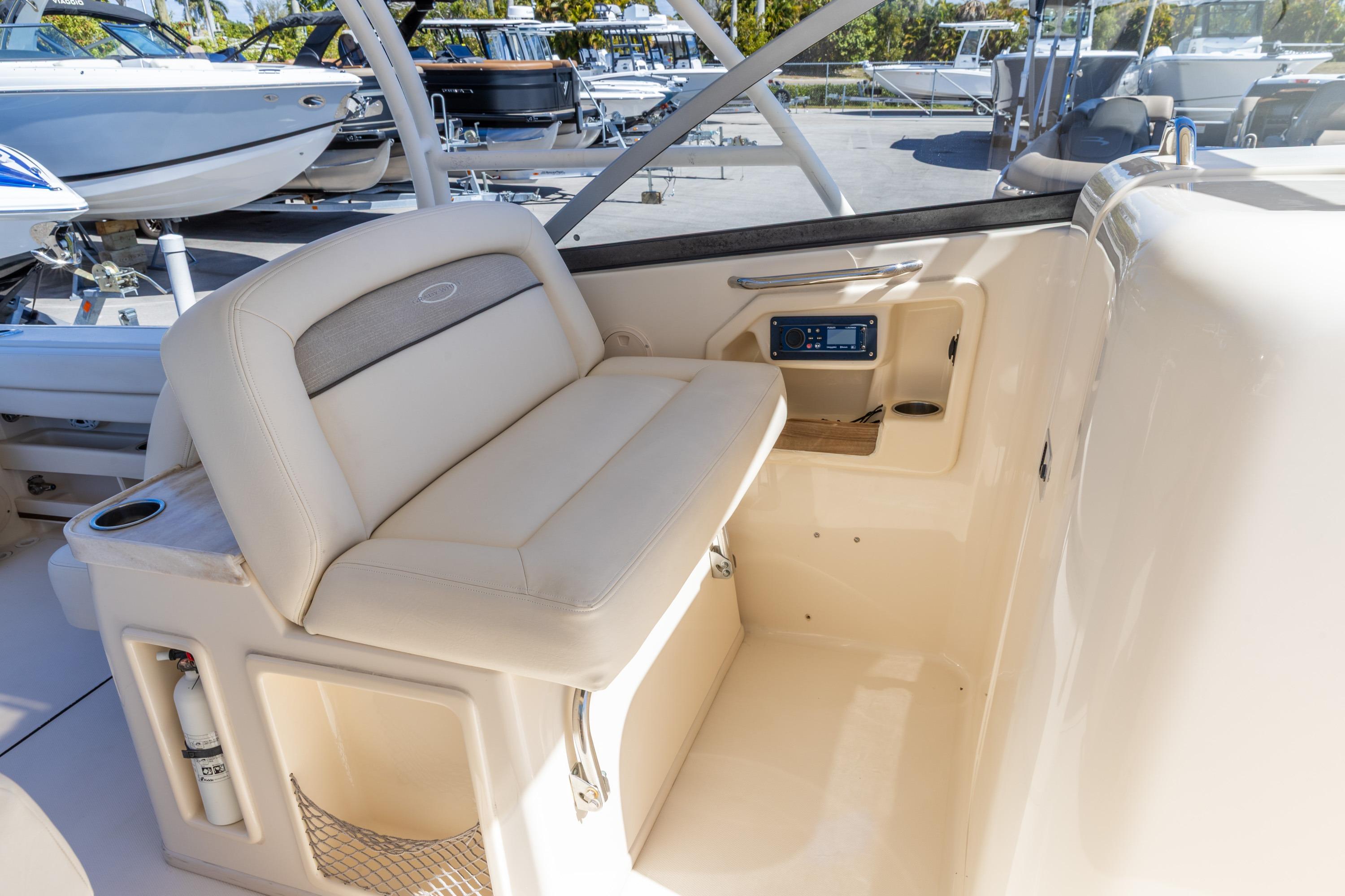 2016 Grady-White Freedom 307 boat interior with seating and control panel.