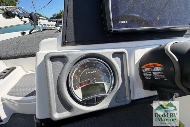 Dashboard of 2021 Caymas CX 18 SS boat with gauge and Helix 9 display.