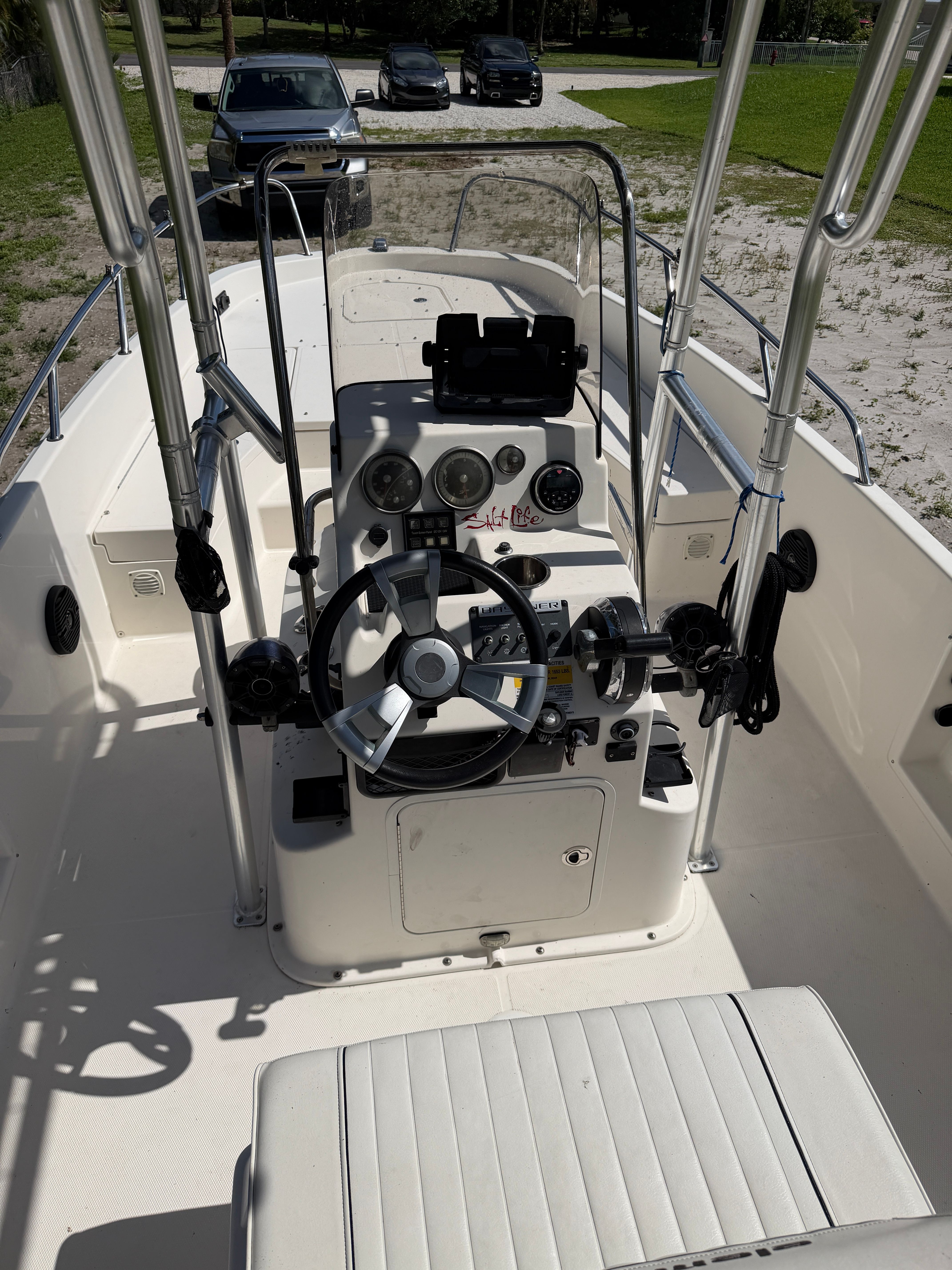 Interior view of a 2018 Bayliner Element F21 boat with steering console.