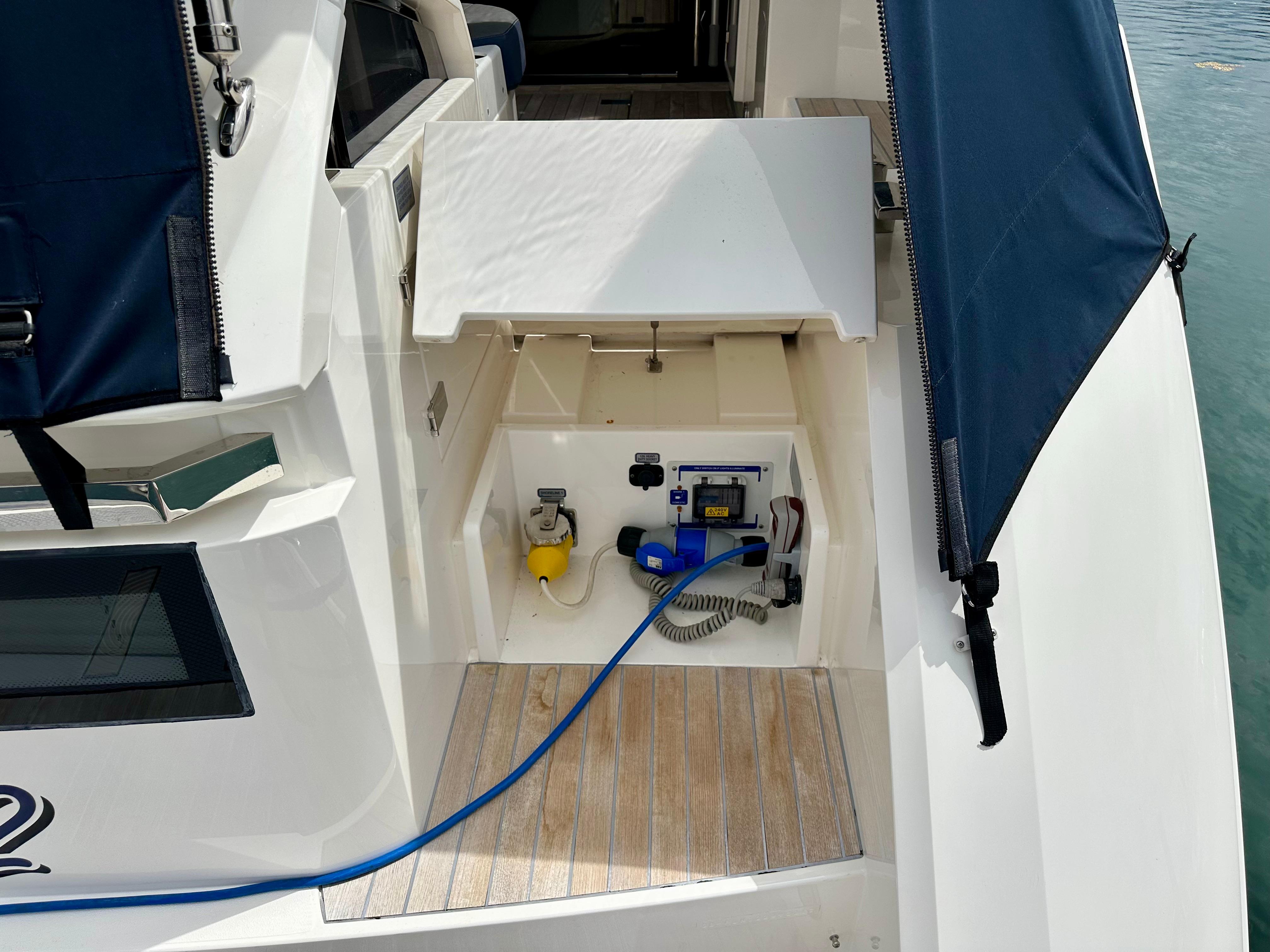 2012 Fairline Targa 50 GT yacht deck with storage compartment and equipment.