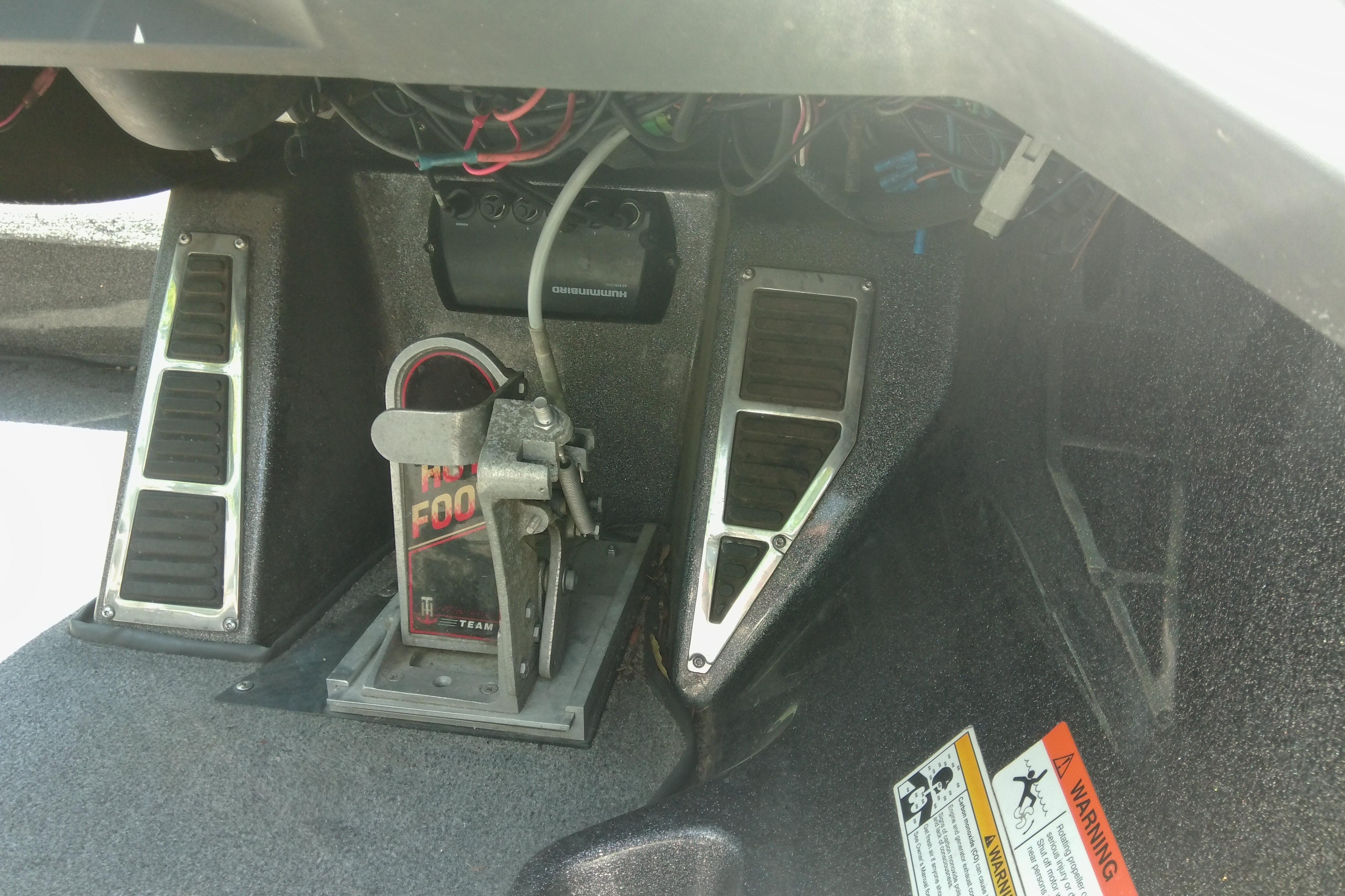 Foot pedal and wiring inside a 2012 Ranger Z520 boat.