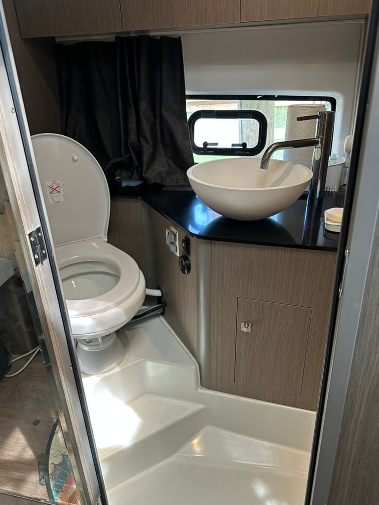 Modern bathroom in Beneteau Gran Turismo 32, 2024 model.