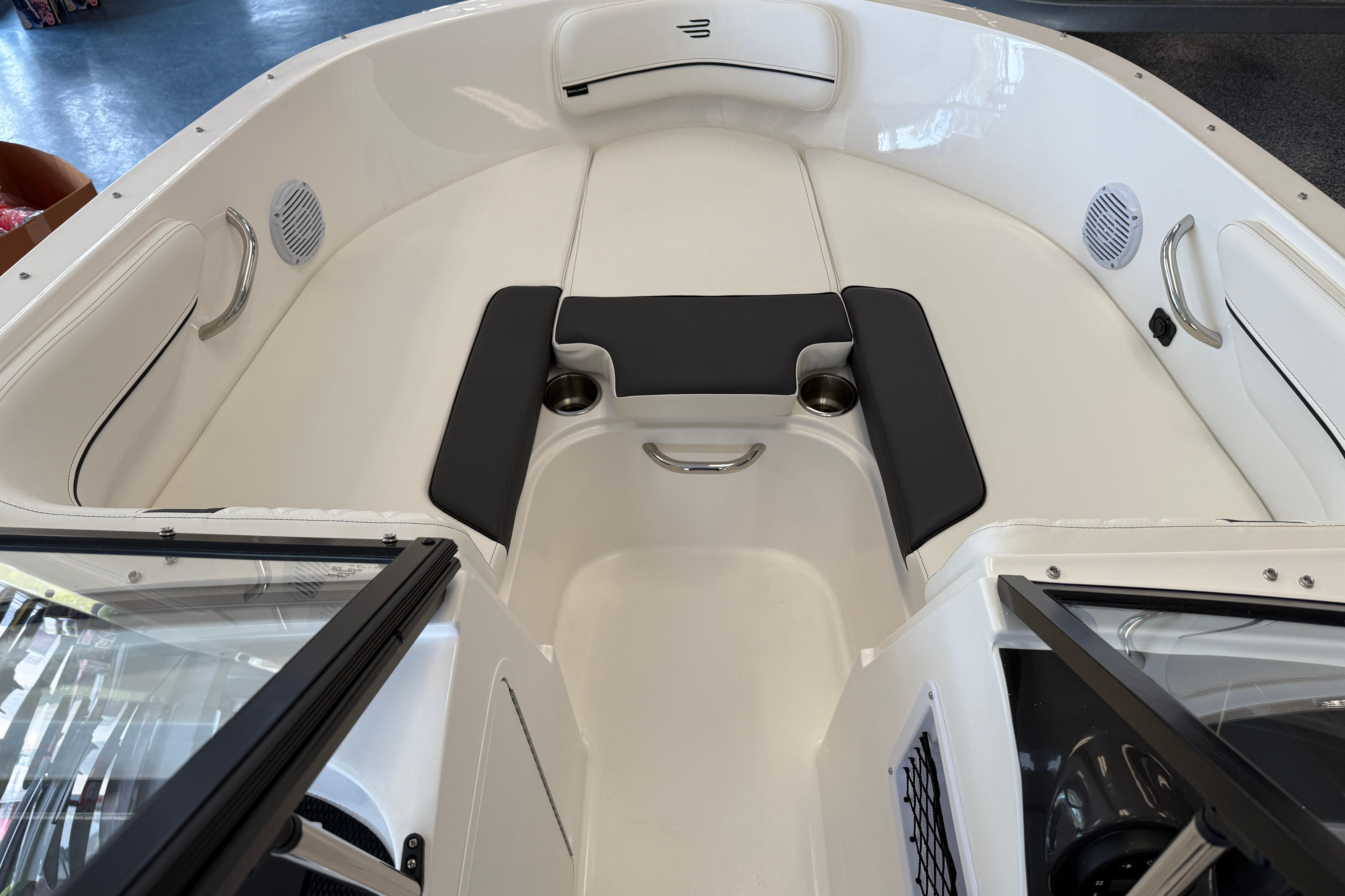 2025 Bayliner VR4 Bowrider OB interior with cushioned seating and cup holders.