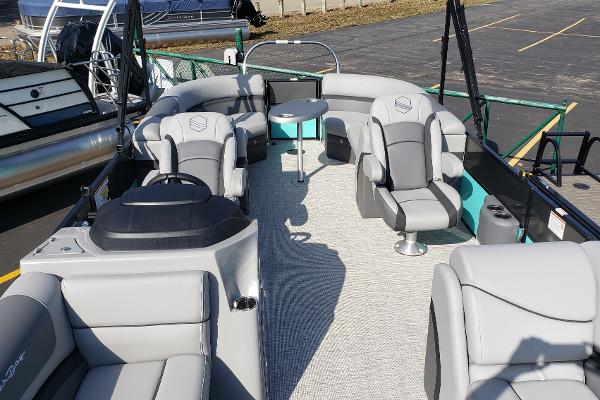 Interior of a 2023 South Bay S224RS25 pontoon boat with luxurious seating.