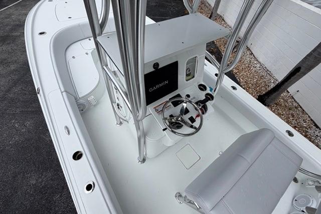 2025 Contender 26 Bay boat cockpit with Garmin navigation system and sleek design.
