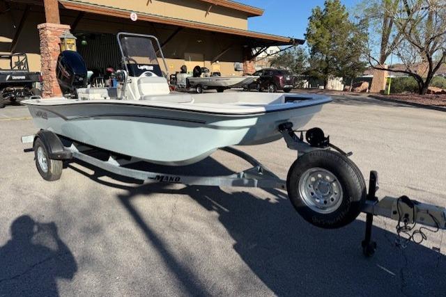2026 Mako Pro Skiff 15 CC boat on trailer in outdoor setting.