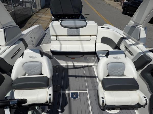 2023 Chaparral 267 SSX boat interior with luxurious seating and modern design.