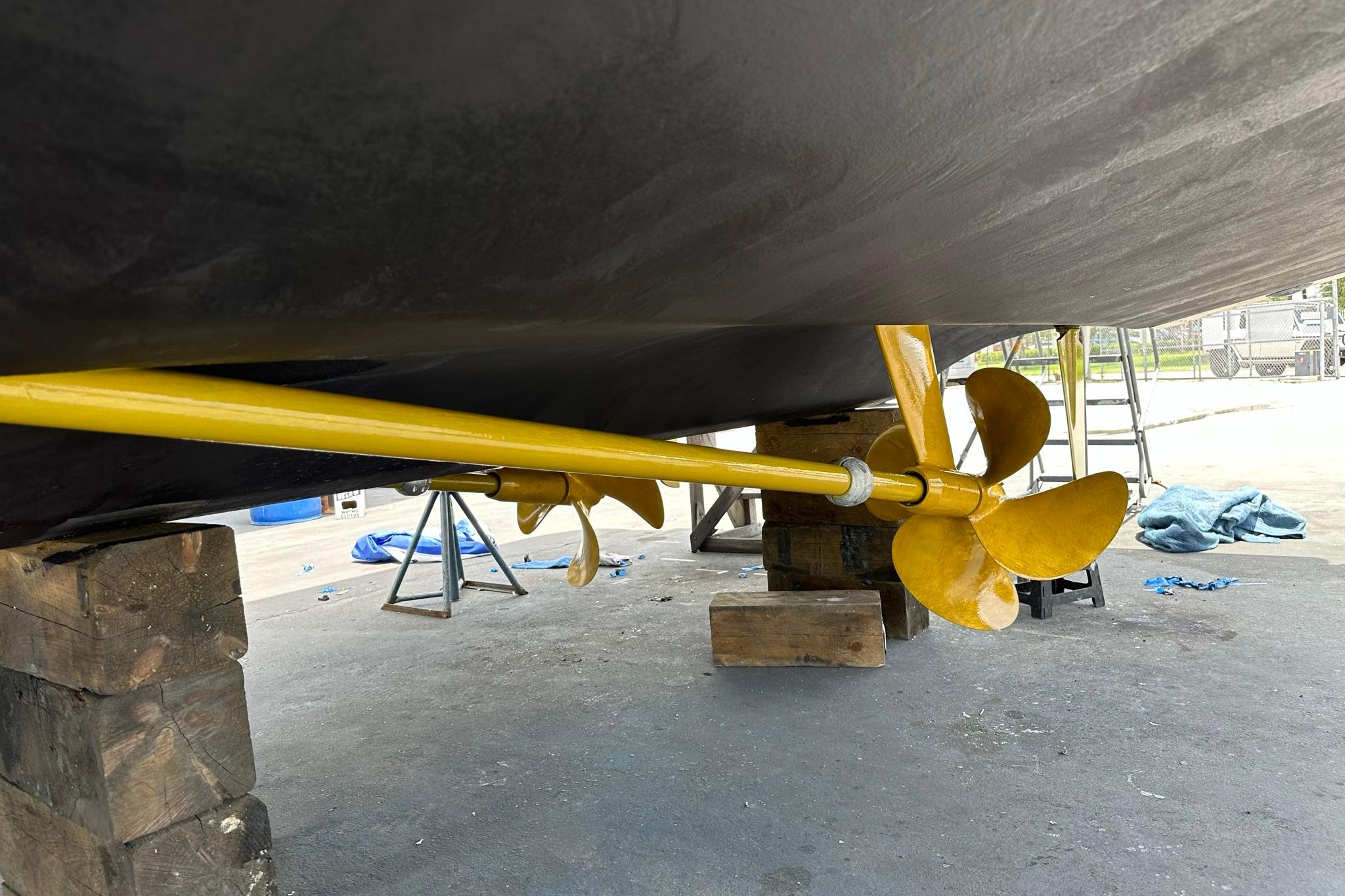 Underwater view of 2013 Azimut Fly 53 yacht propeller and shaft on dry dock.
