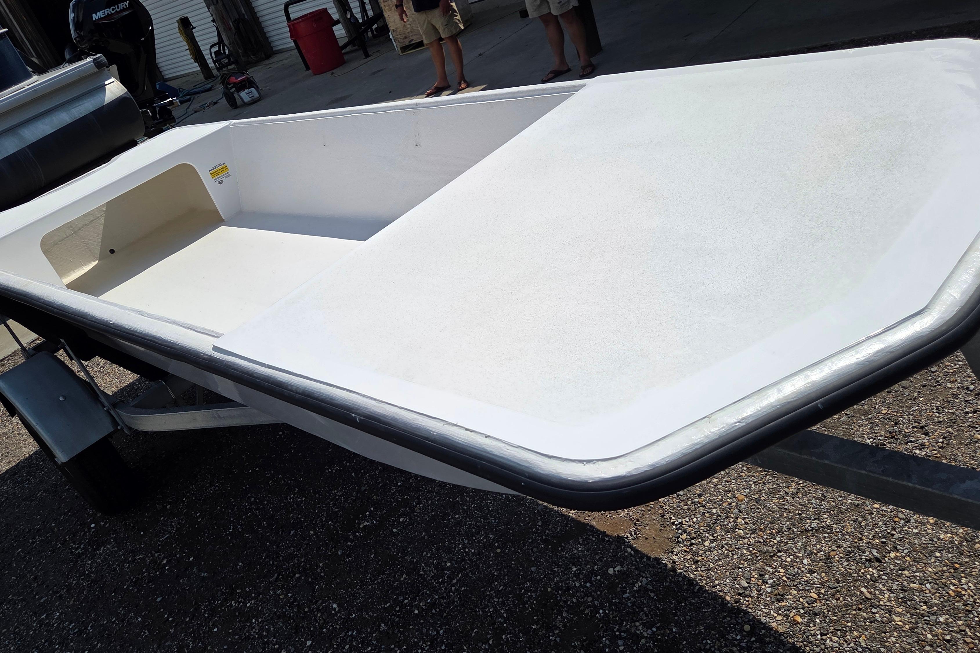 Delta Boatworks 1550, 2027 model, on trailer in outdoor setting.
