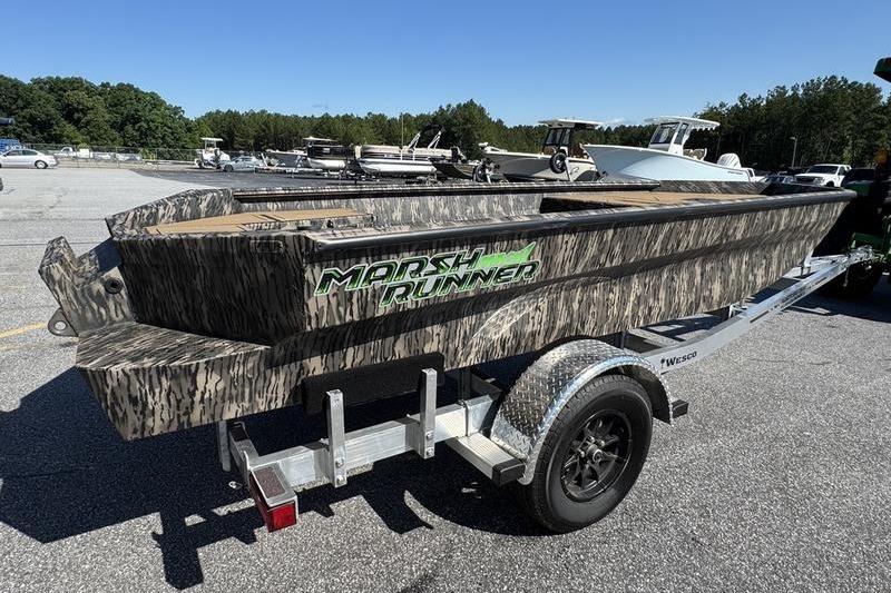 2026 Havoc 1656 MRST MACH 1 Marsh Runner boat on trailer in parking lot.
