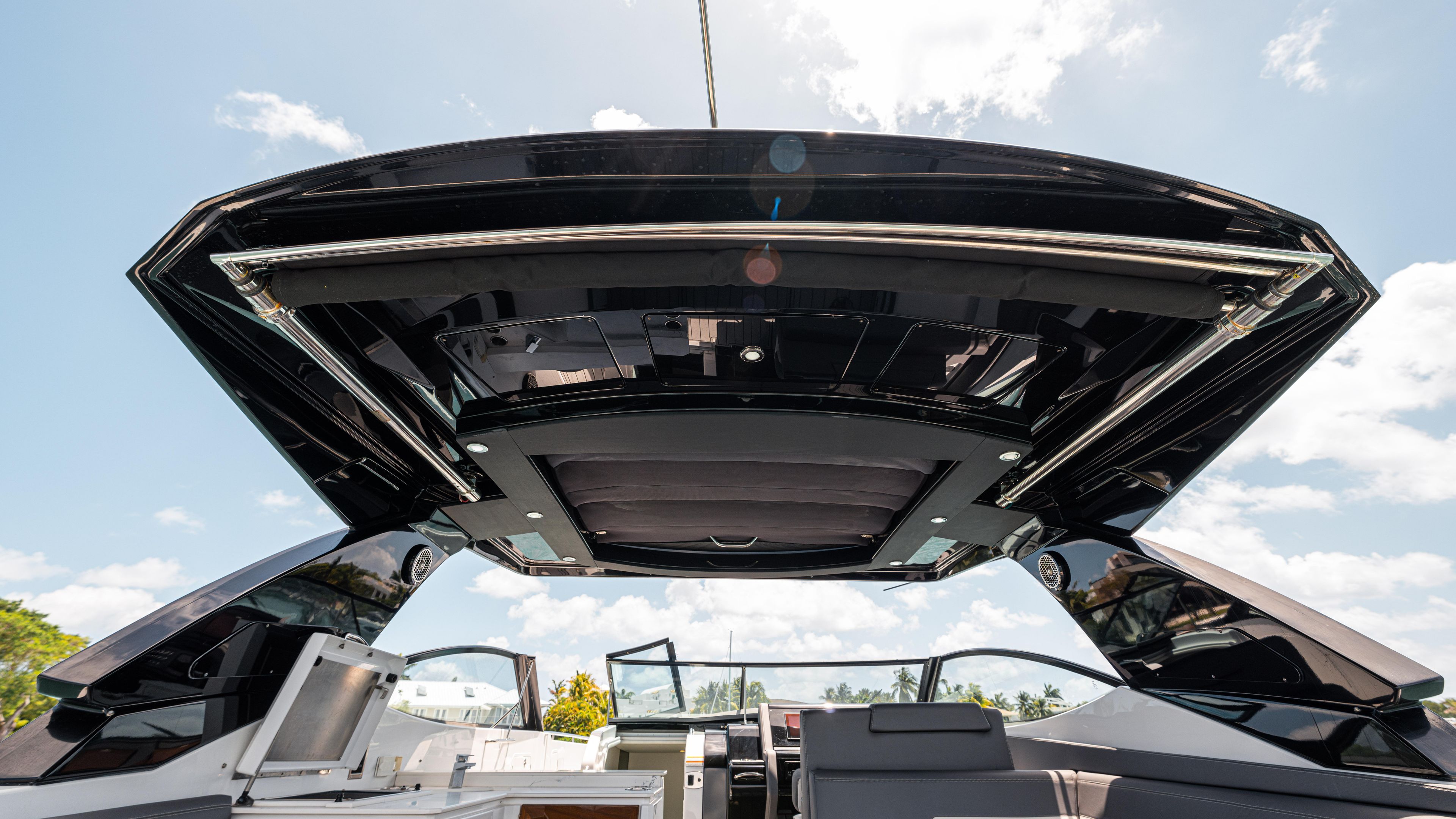 2020 Cruisers Yachts 38 GLS OB boat interior with open sunroof, showcasing sleek design.