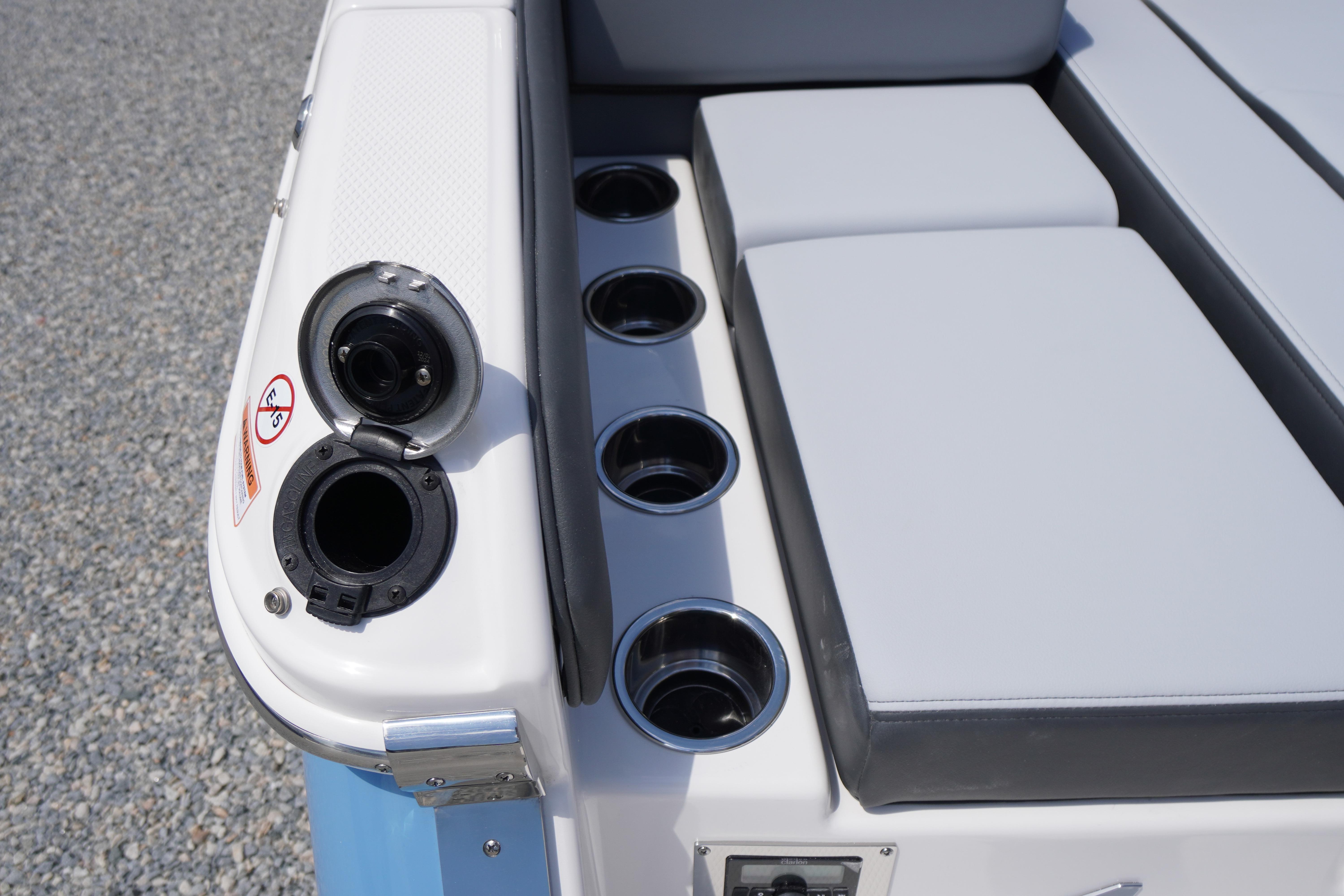 2026 Chaparral SSX 4 boat interior with cup holders and seating.