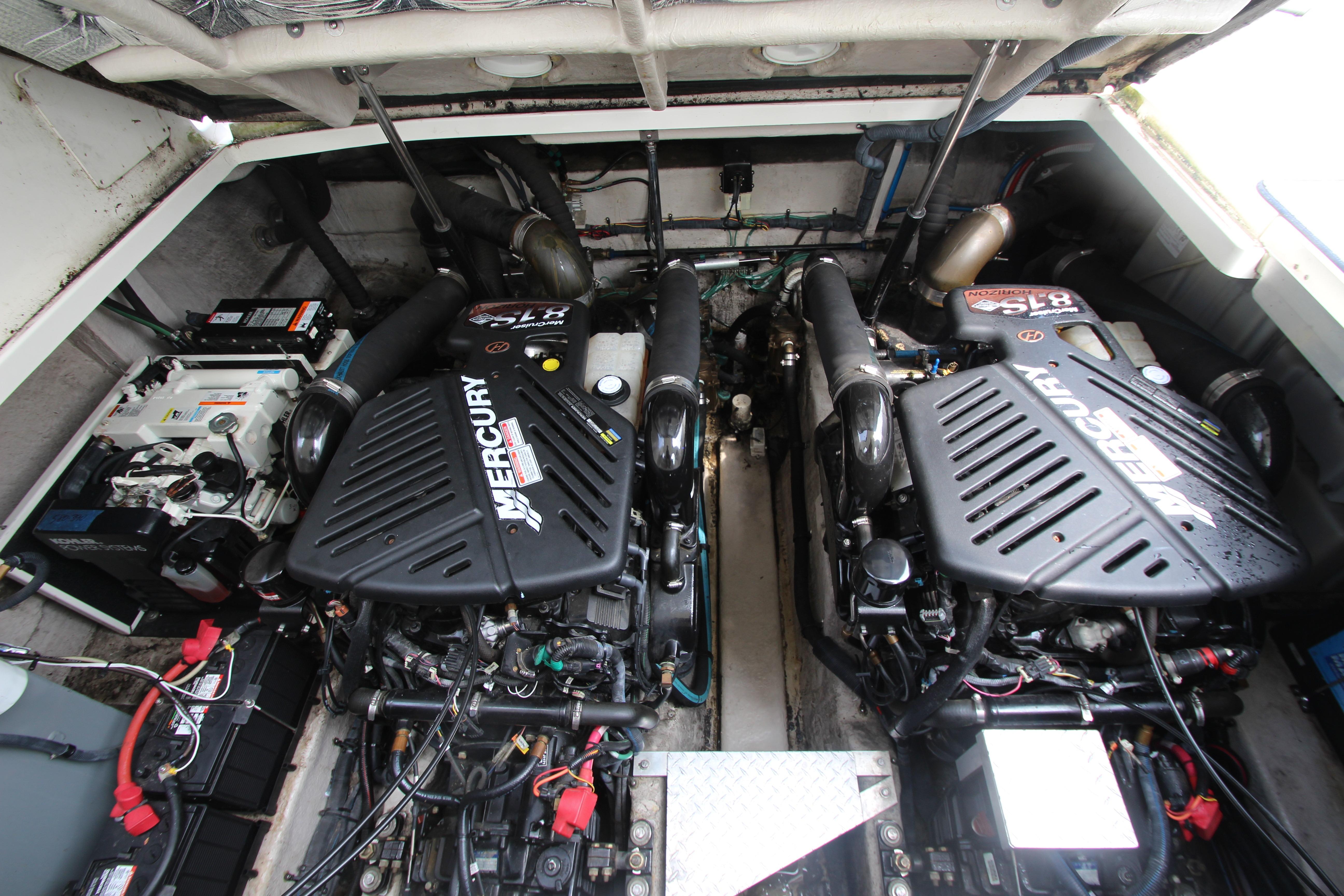 Engine room of 2004 Sea Ray 40 Sundancer with twin Mercury engines.
