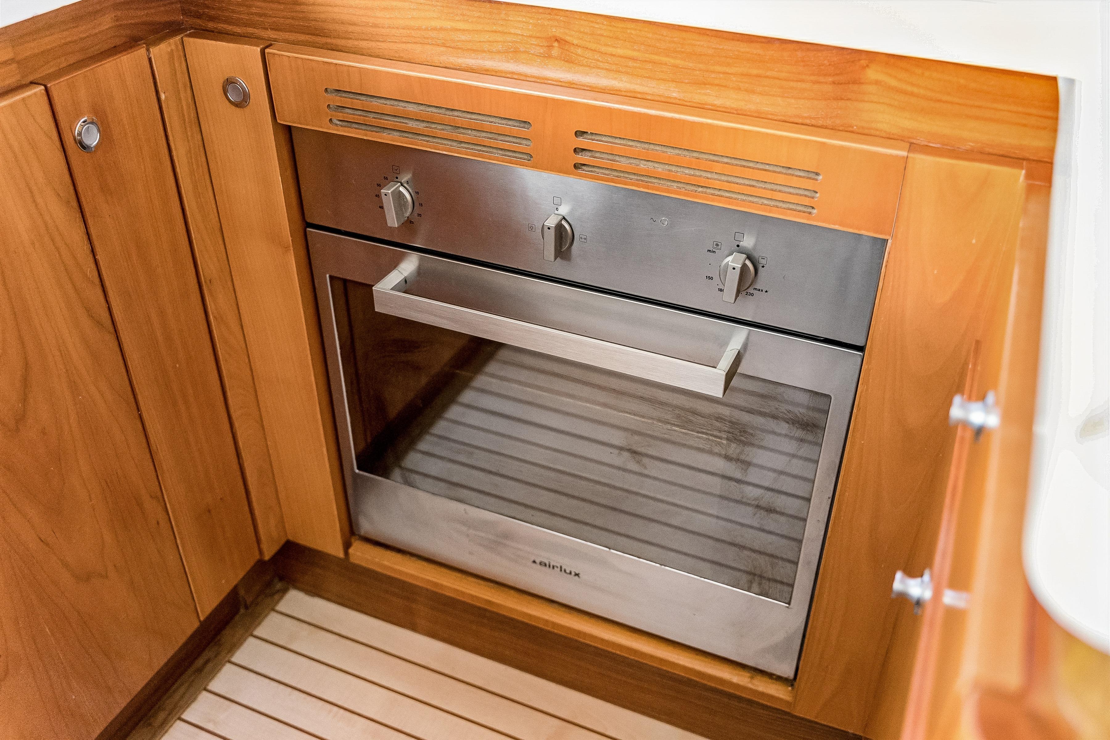 Built-in stainless steel oven in a Catana 65 yacht kitchen, 2009 model.