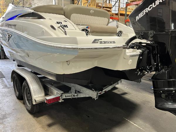 2023 Crownline Eclipse E235 XS boat on trailer, featuring a Mercury outboard motor.