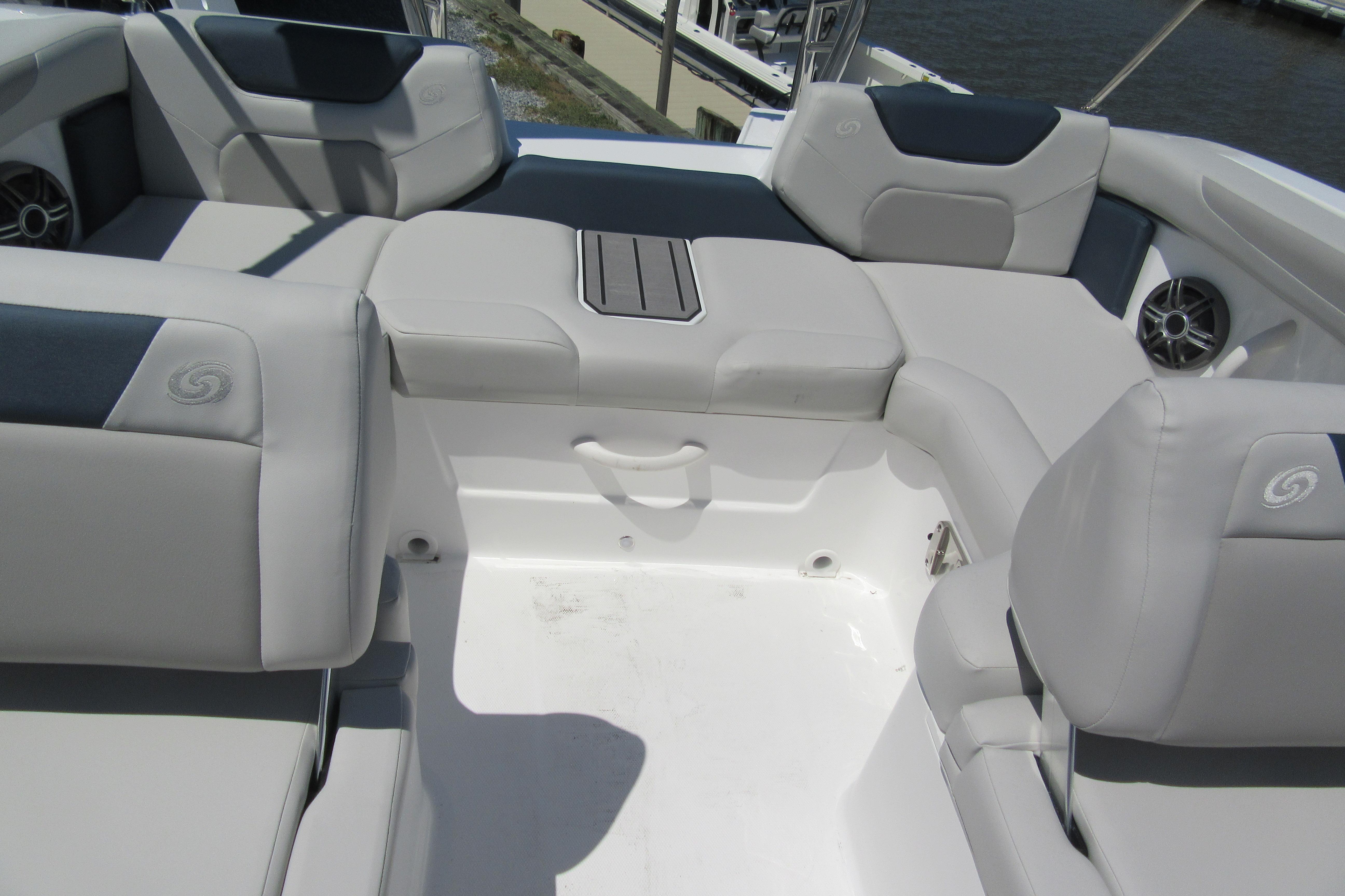 2027 Hurricane SunDeck 2050 OB boat interior with plush seating and modern design.