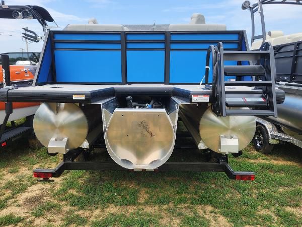 2024 Viaggio Lago X22Q pontoon boat rear view on grass.