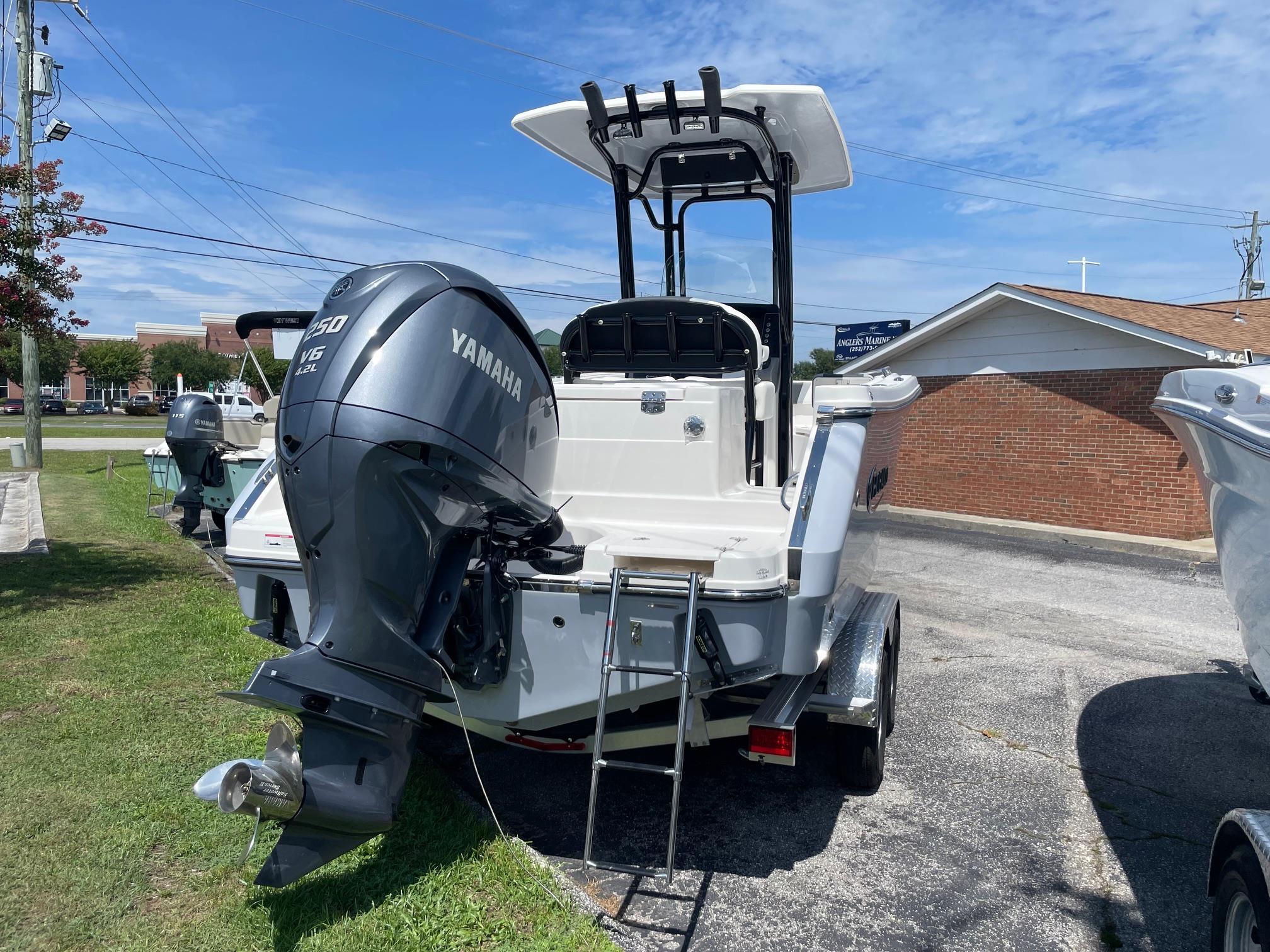 2025 Robalo R230 Center Console boat with Yamaha V6 engine on trailer.