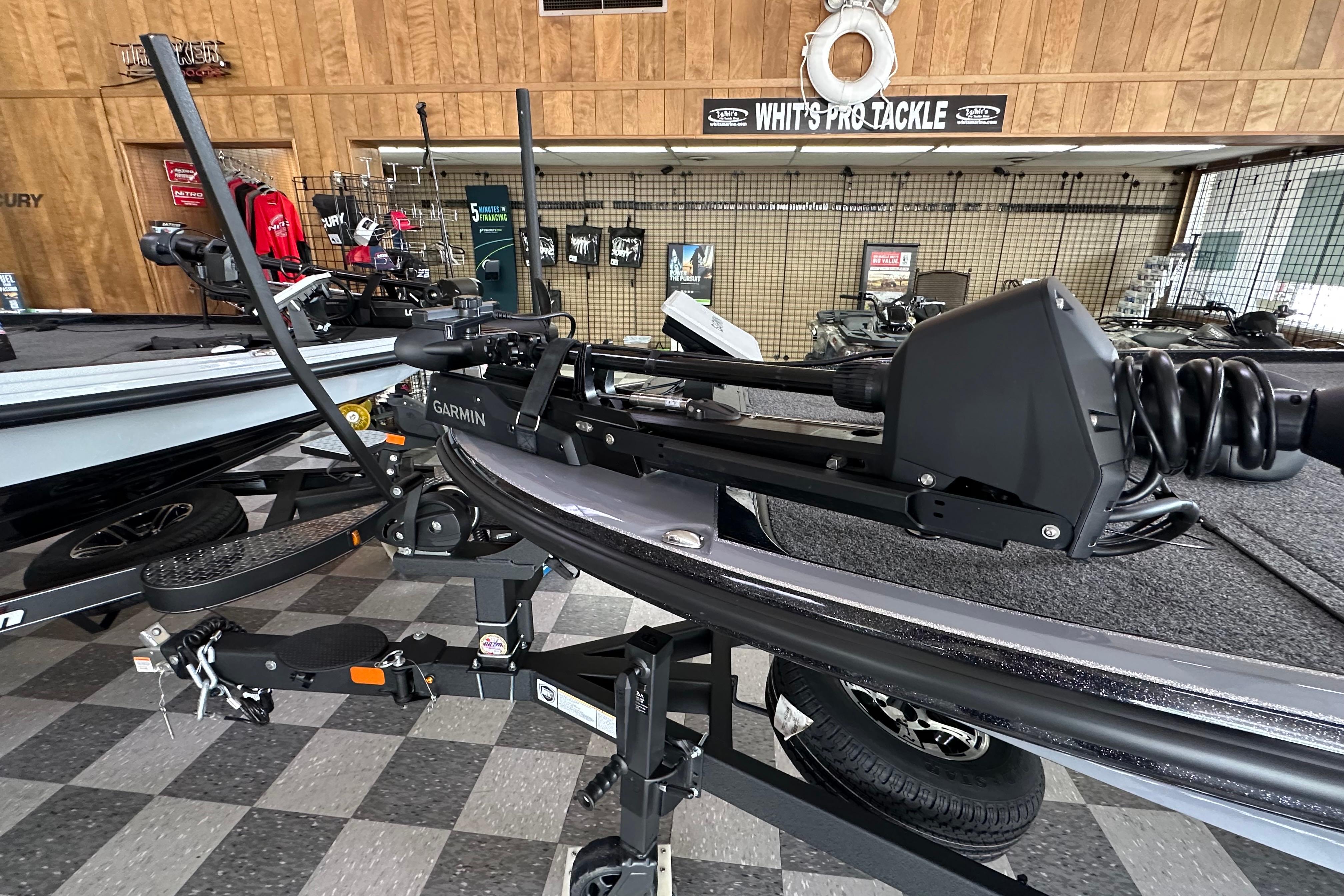 2025 Nitro Z20 XL Pro boat with Garmin equipment in showroom.