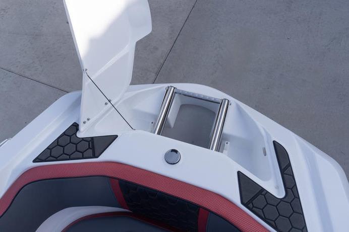 2026 Scarab 255 LX Wake boat bow with open hatch and sleek design.