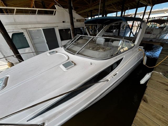 2002 Bayliner 2855 boat docked at marina.