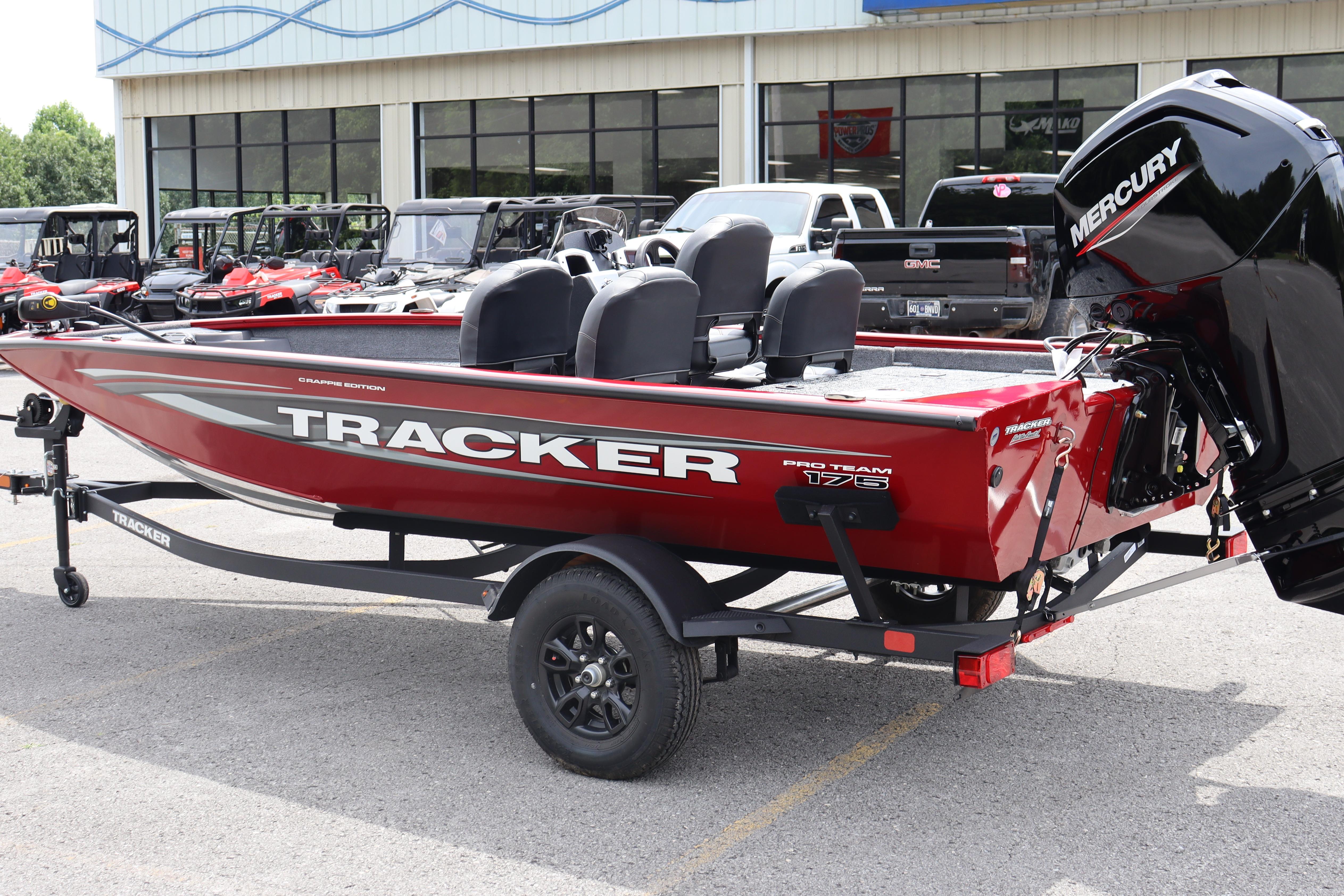 2026 Tracker Pro Team 175 Crappie Edition boat with Mercury engine, parked outdoors.