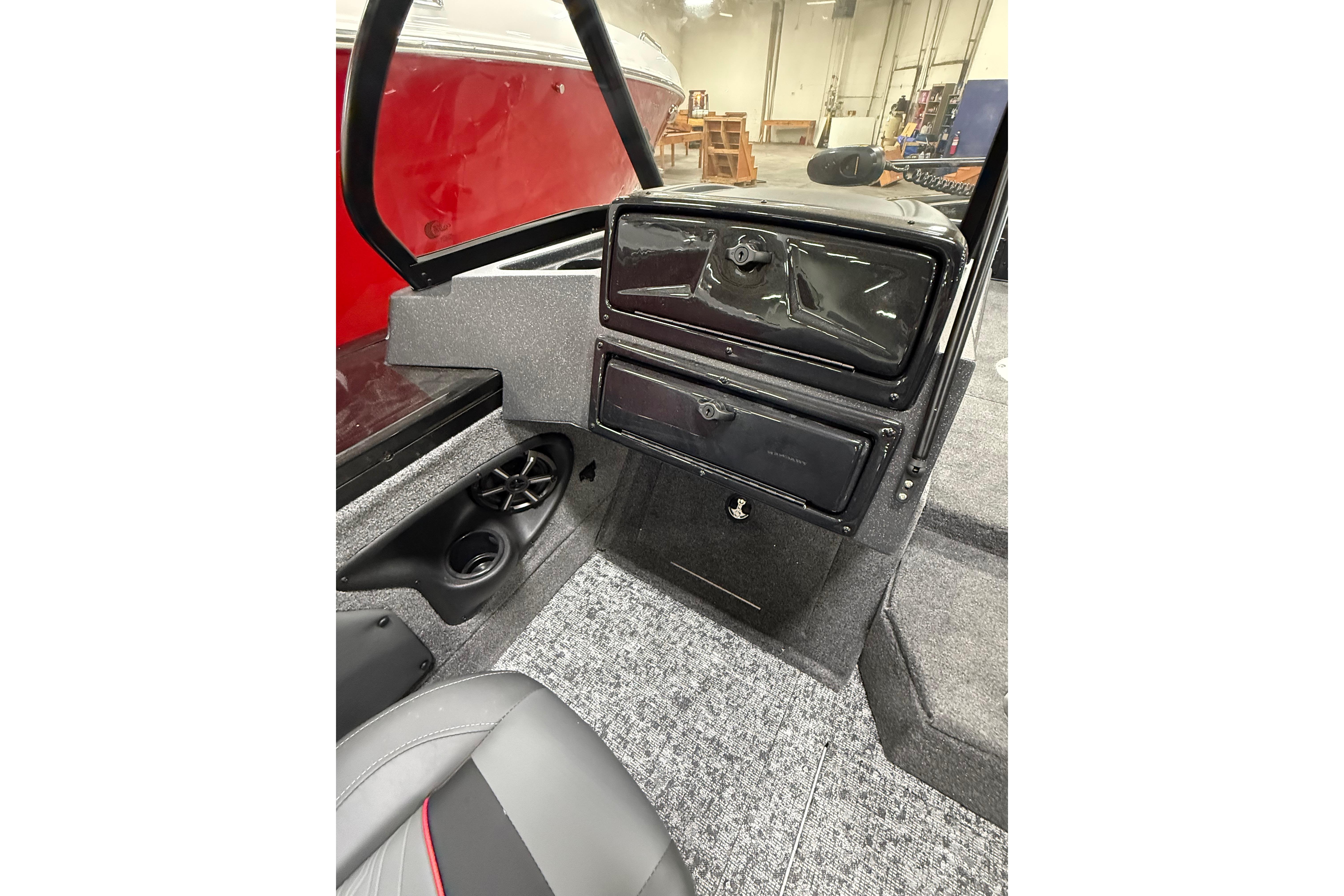 Interior of 2026 Tracker Targa V-19 WT boat, featuring dashboard and seating area.