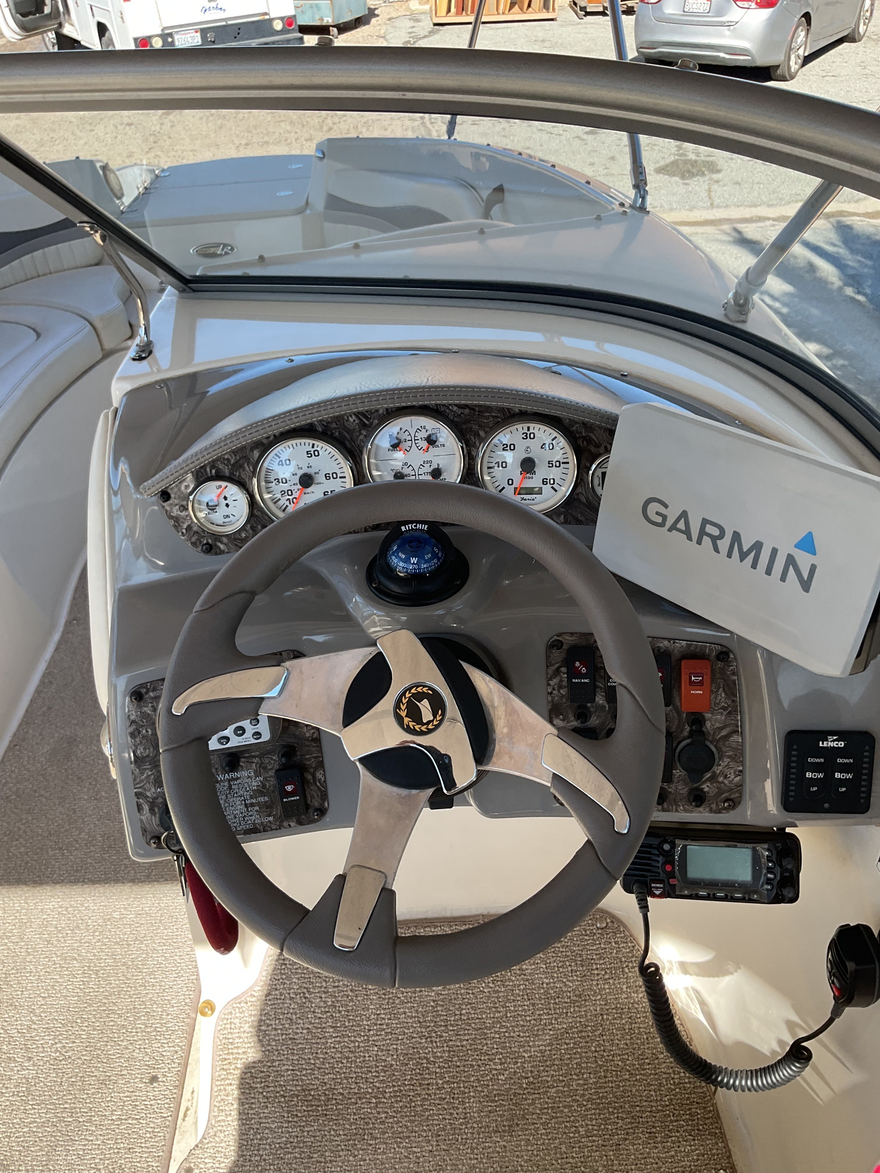 2011 Stingray 235 LR dashboard with Garmin navigation system.