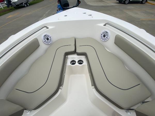 2024 Key West 203 FS boat with cushioned bow seating and built-in speakers.