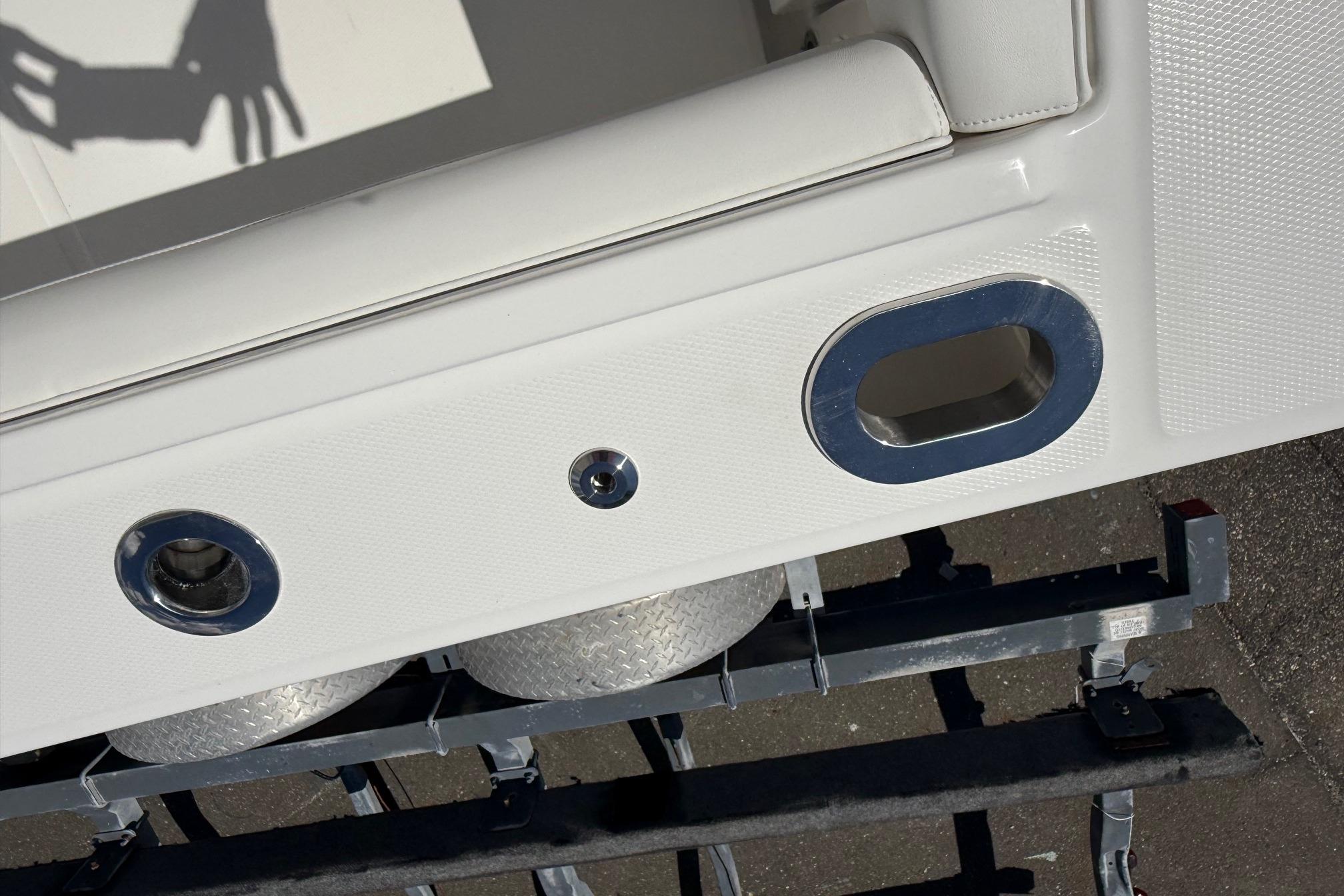 2026 Regulator 25 boat detail showing fittings and textured surface.