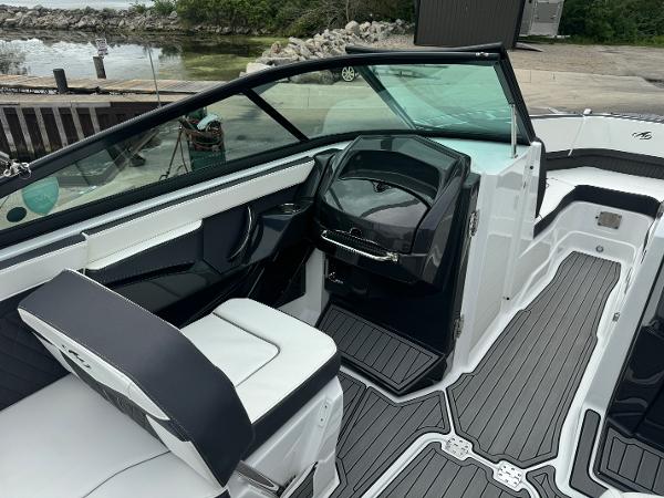 2018 Monterey 258 Super Sport boat interior with sleek seating and modern dashboard design.