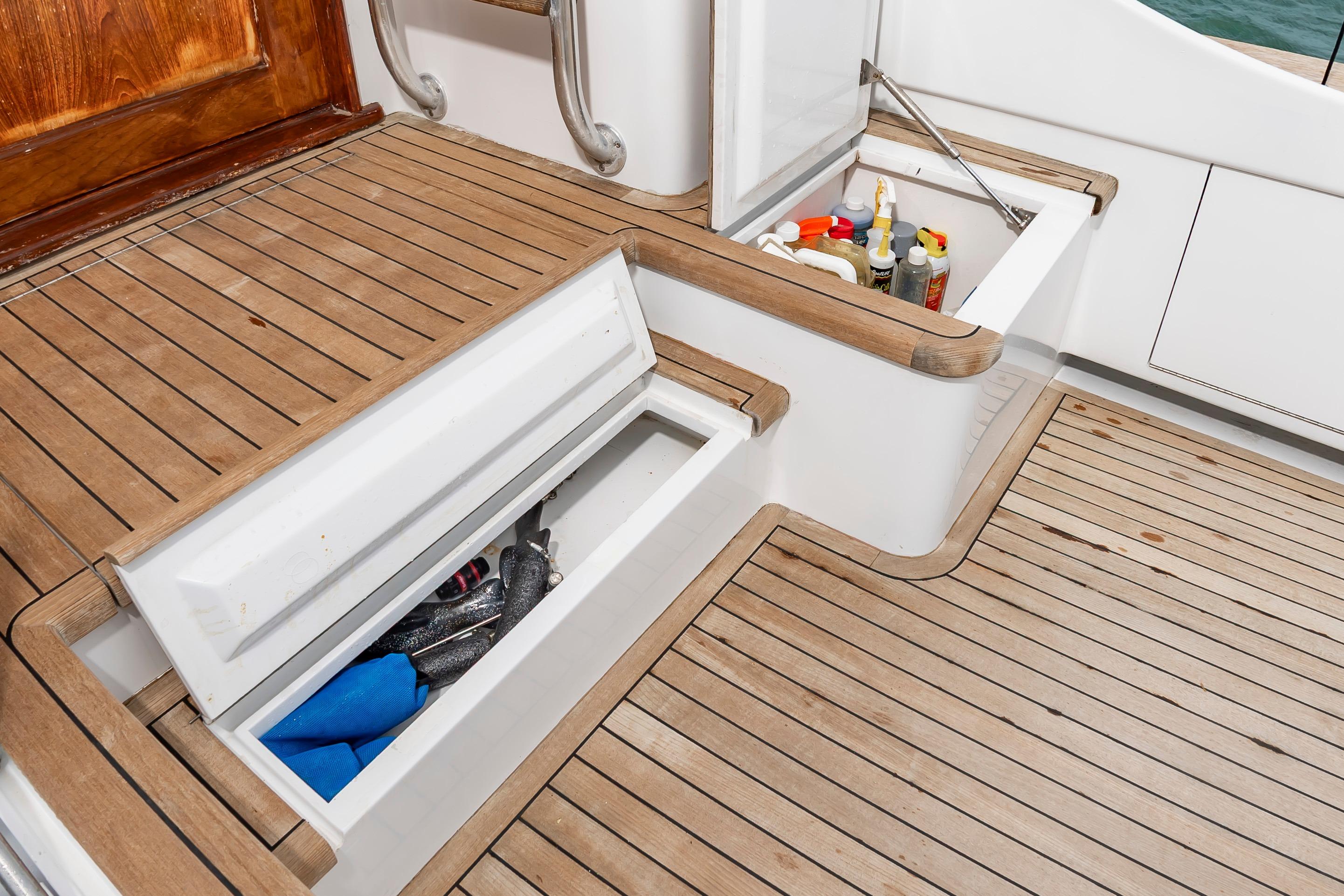Storage compartments on a 1993 Custom Carolina Scarborough 56 Convertible yacht deck.