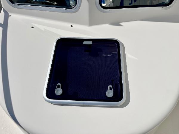 2023 Defiance Admiral 220 EX boat hatch with sleek design and dual latches.