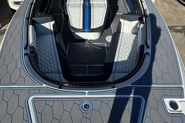 2024 Fountain 34 SC boat interior with modern seating and hexagonal pattern design.