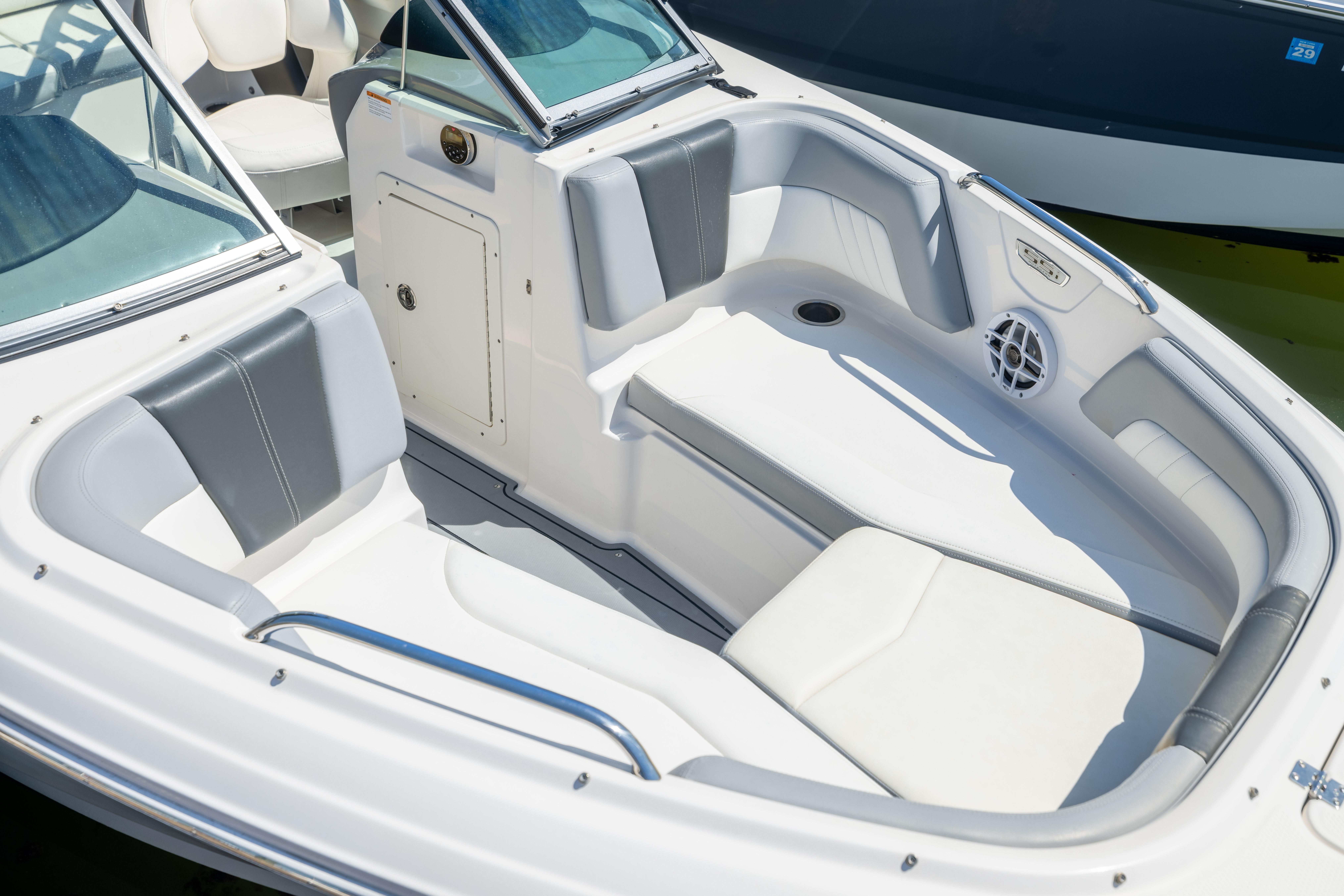 2022 Chaparral 21 SSi OB boat interior with white and gray seating.