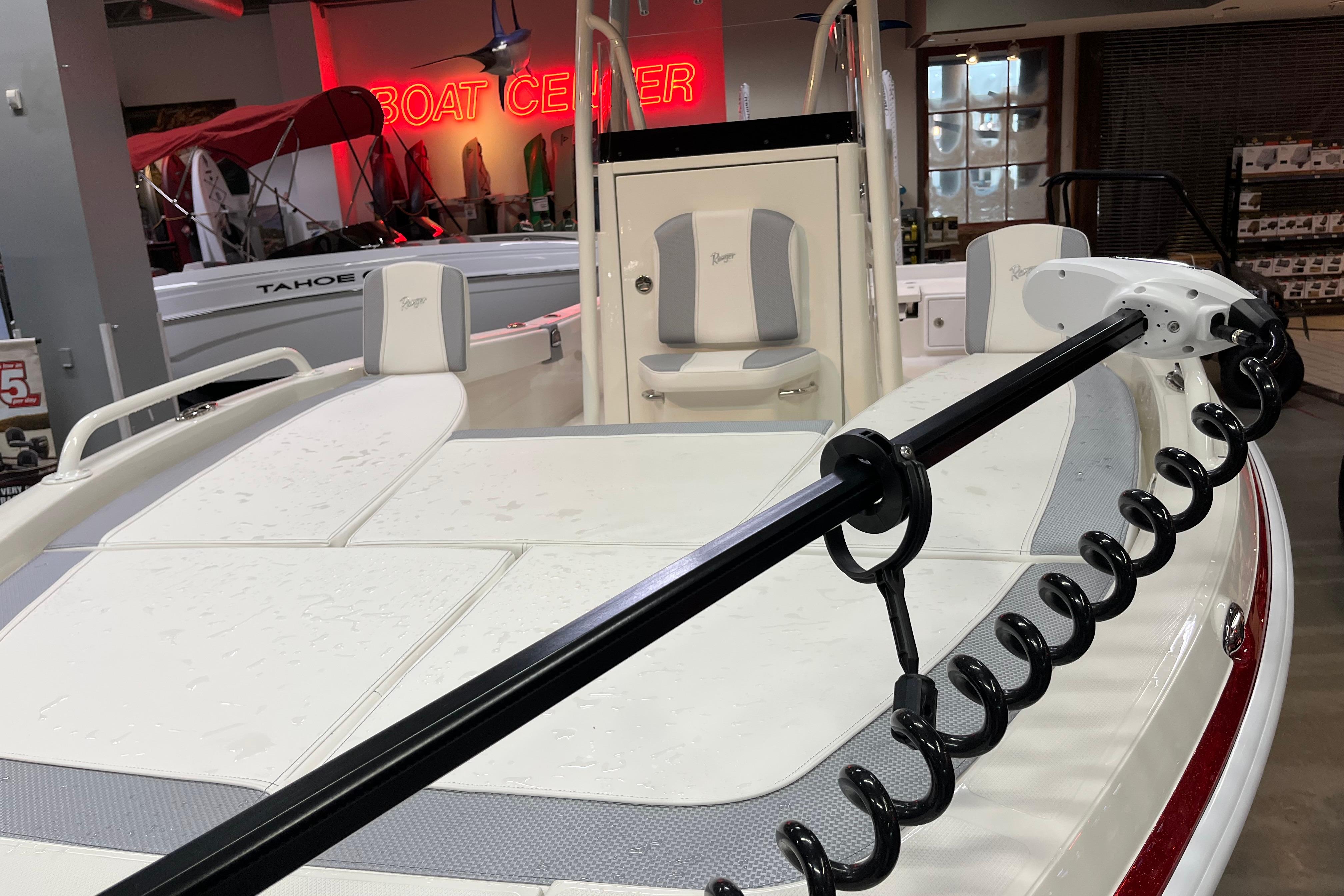 2026 Ranger 2510 Bay boat displayed at a boat center showroom.